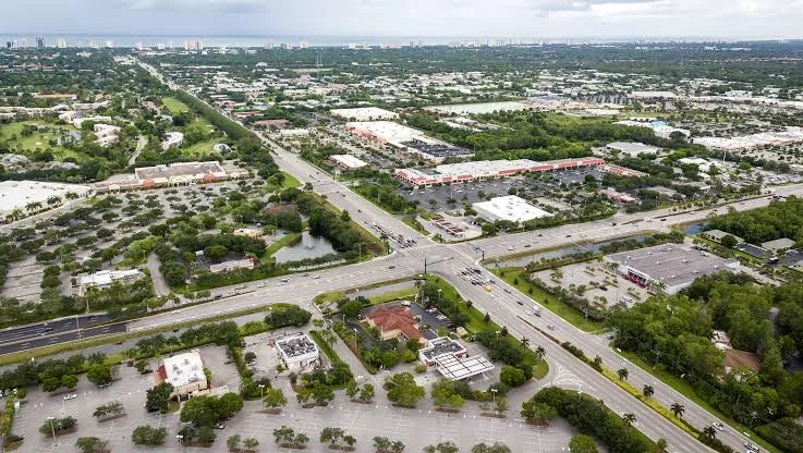 Aerial view of a North Naples intersection with surrounding neighborhoods and shopping