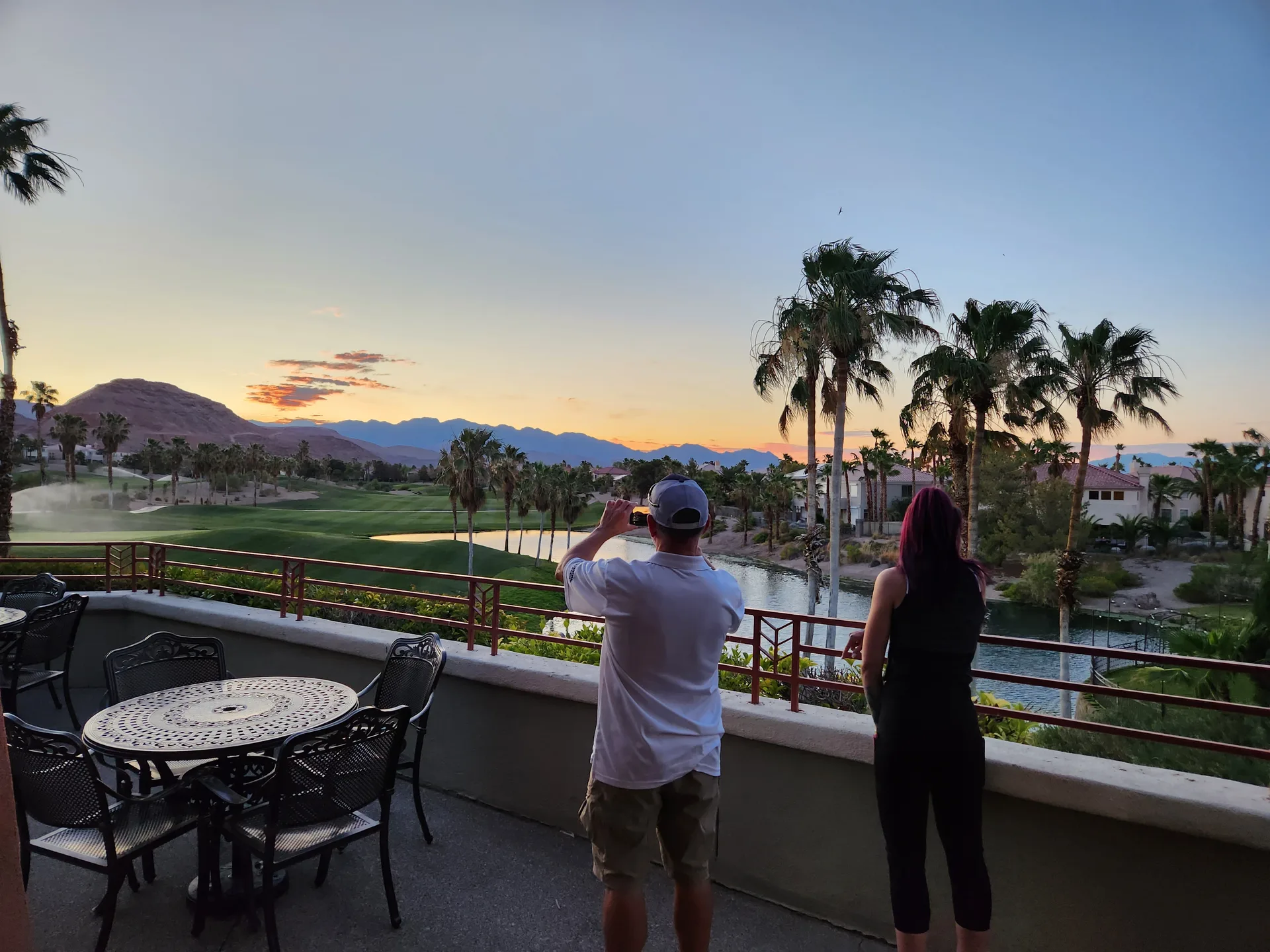 Martin's photo of the lake and golf course view from a residential balcony at Rhodes Ranch at sunset