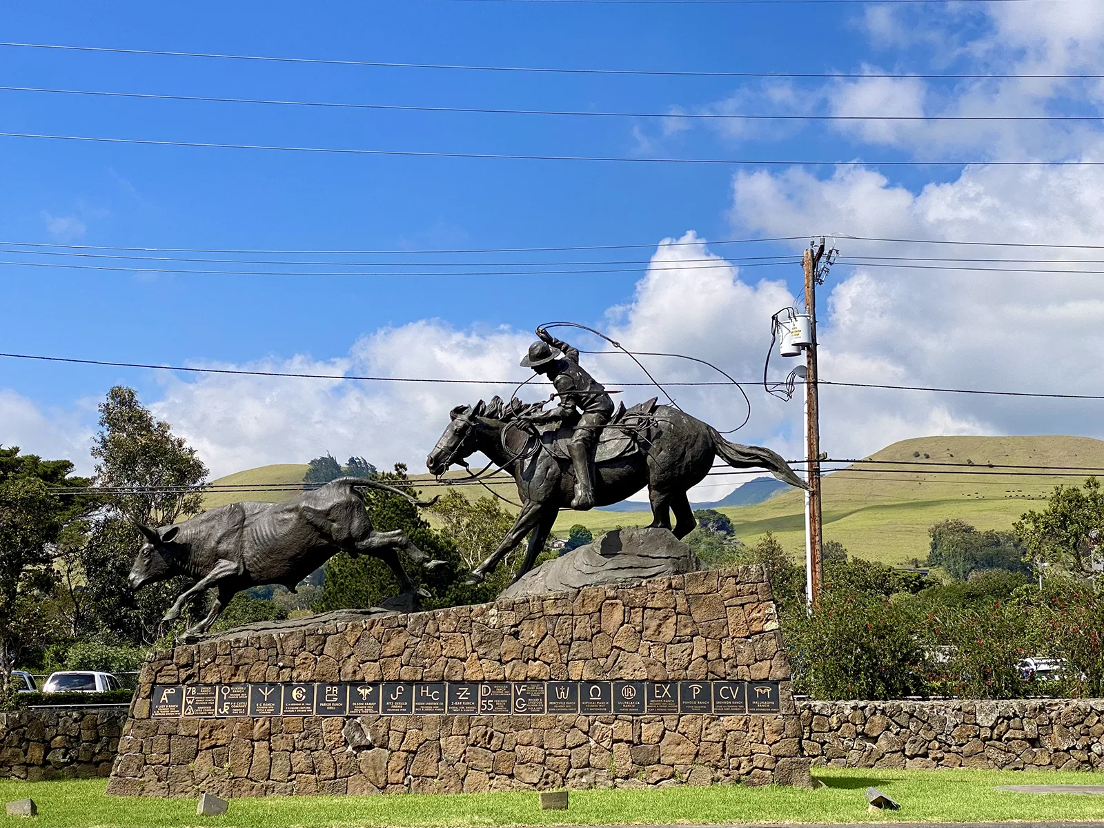 The bronze statue of Ikua Purdy roping a steer, in front of the Parker Ranch Shopping Center in Waimea