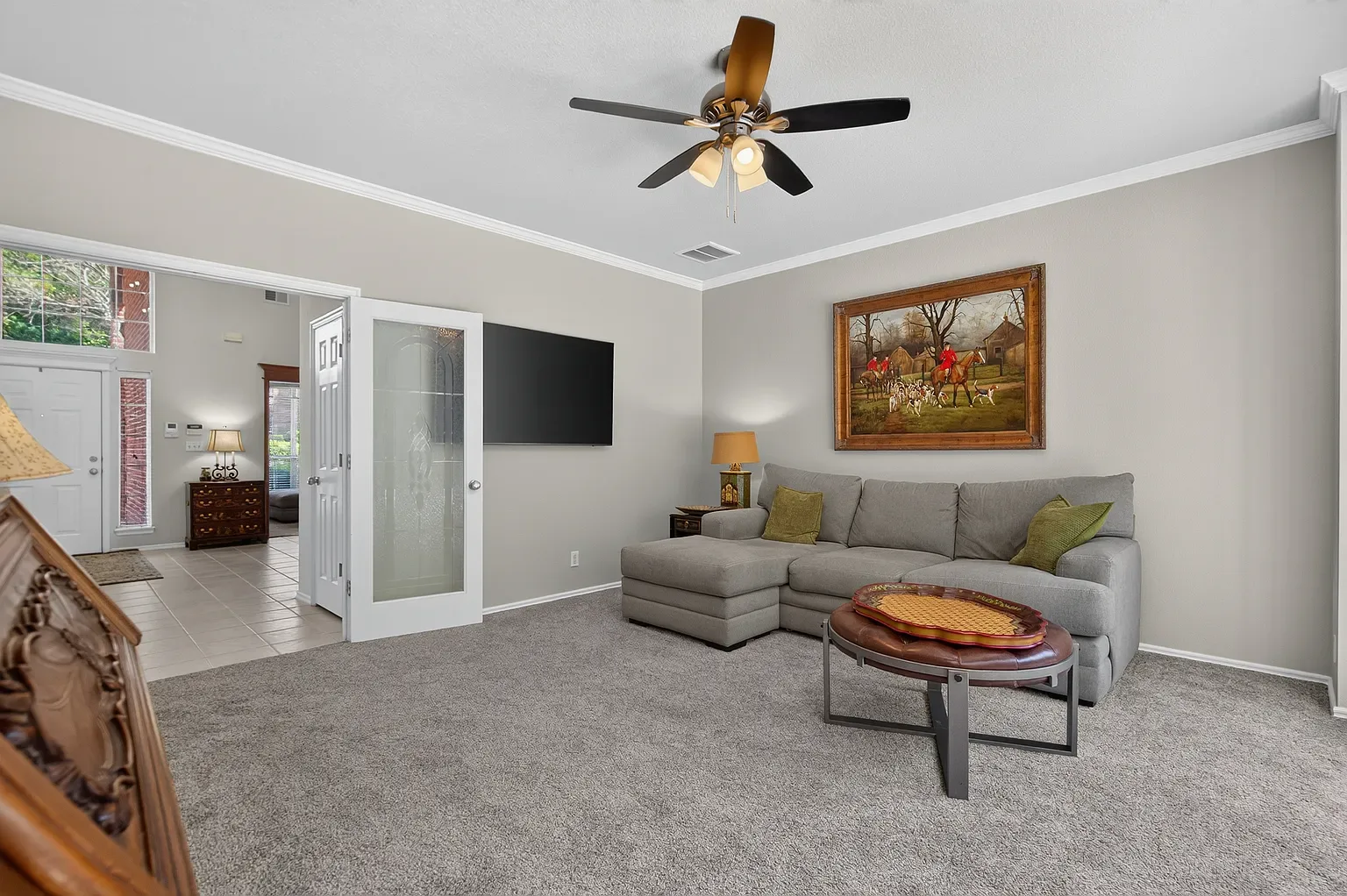 Cozy den with crown molding