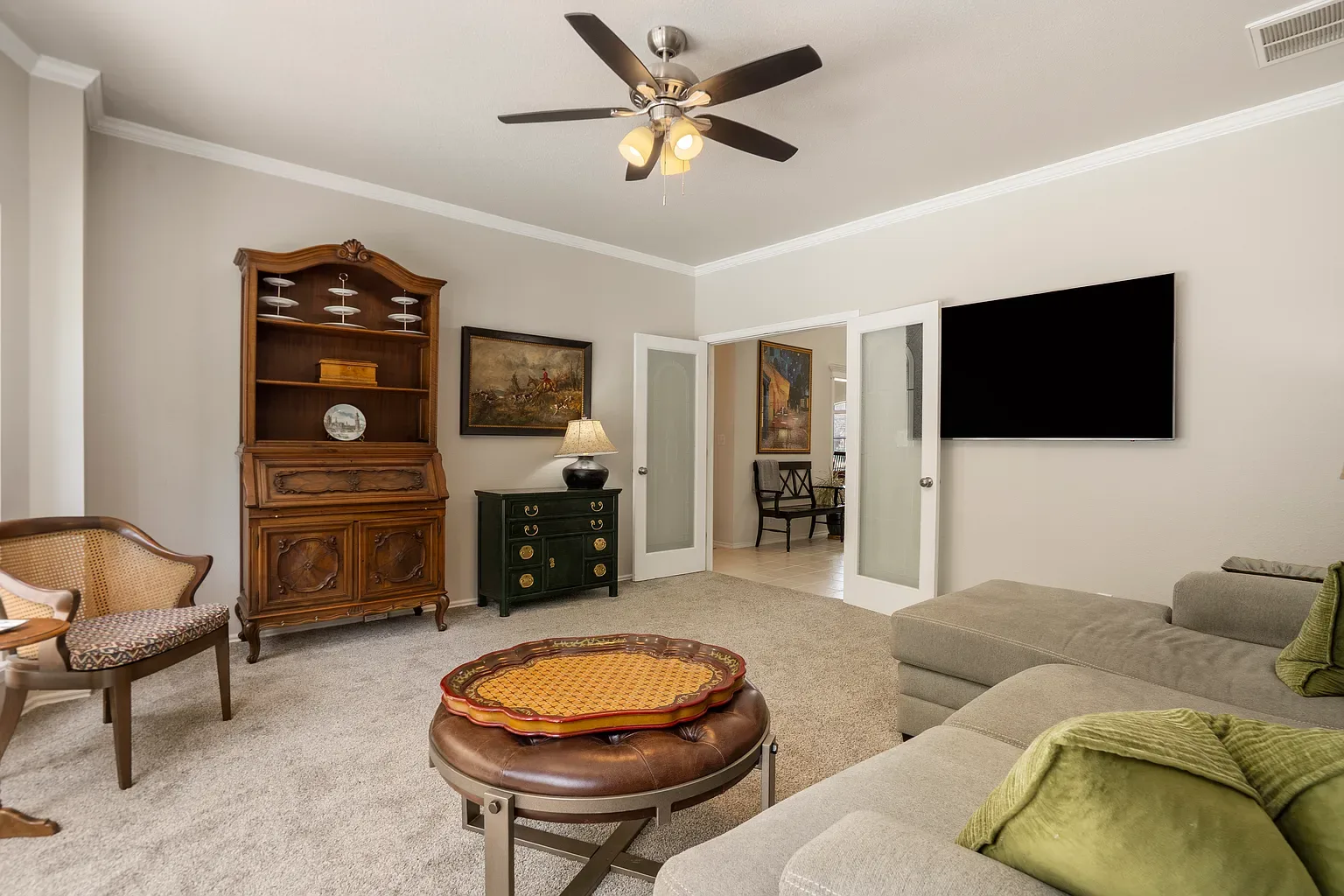 Den with French doors to the adjacent room