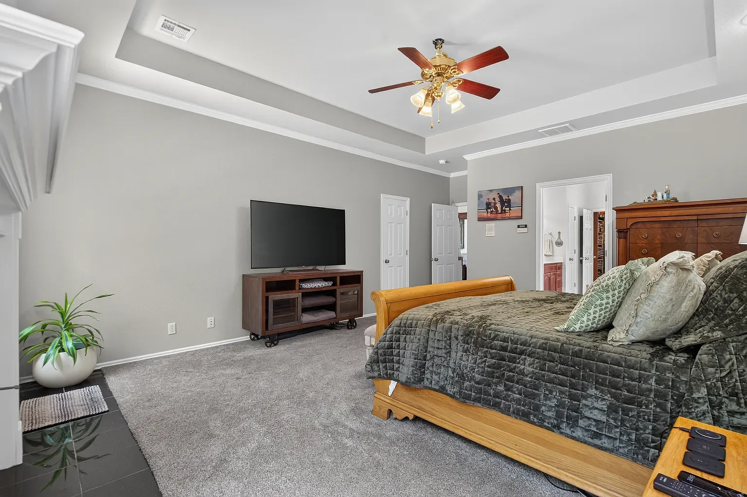 Primary suite, wide view with coffered ceiling