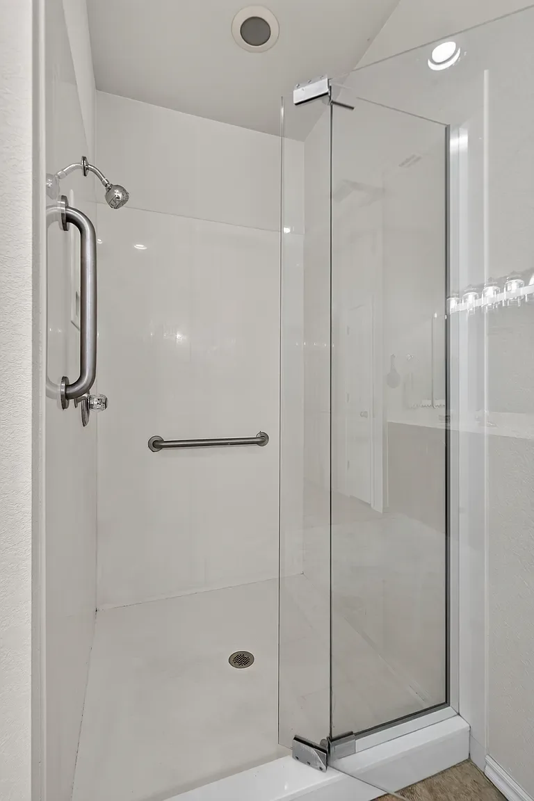 Walk-in shower with glass door