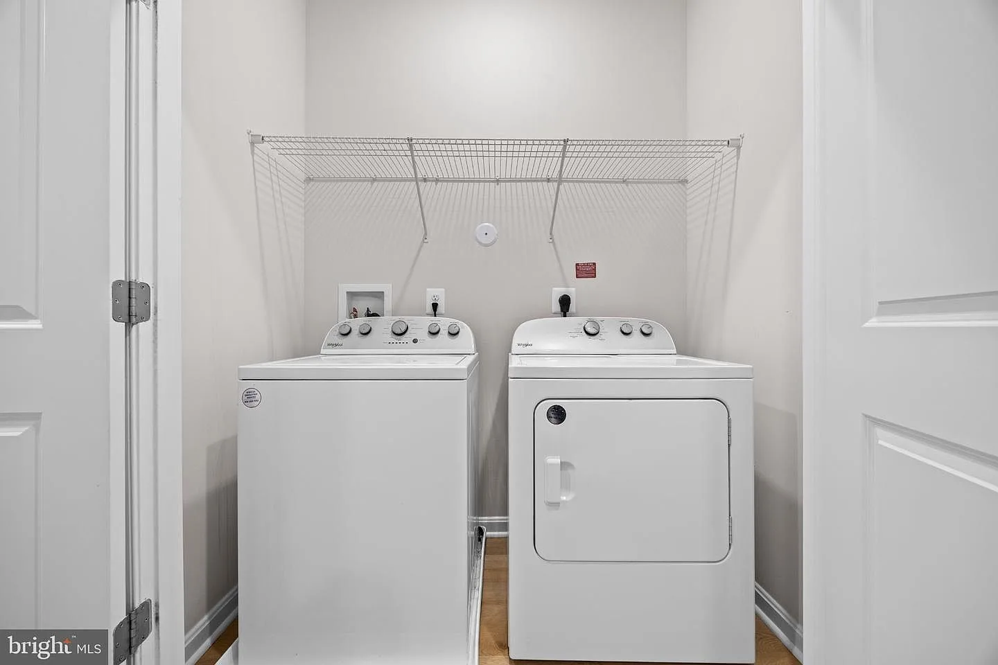 Third-floor laundry closet with washer and dryer