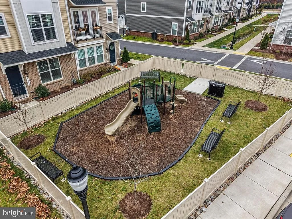 Community playground with slide and climbing structure