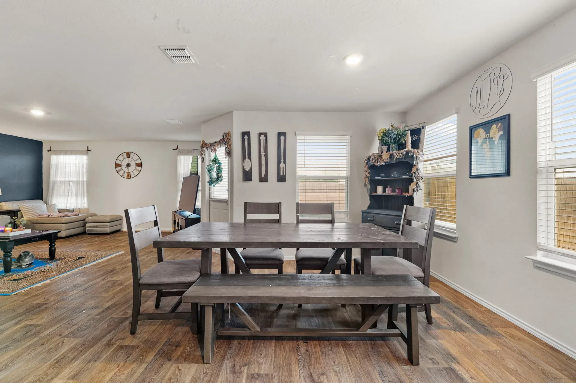 Open-concept dining and living areas flowing together on one level
