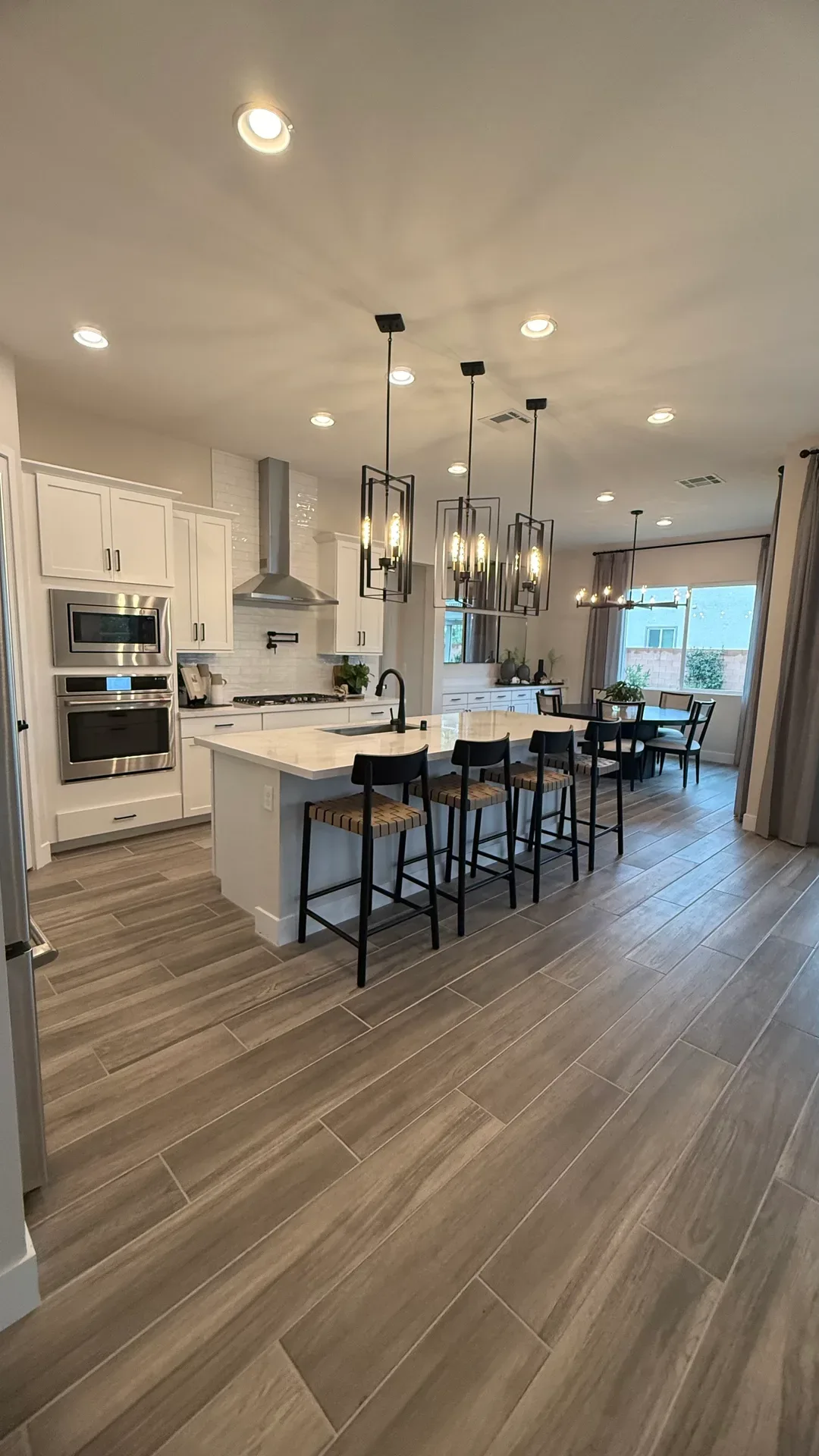 Bright open-concept Las Vegas kitchen and dining area with natural light