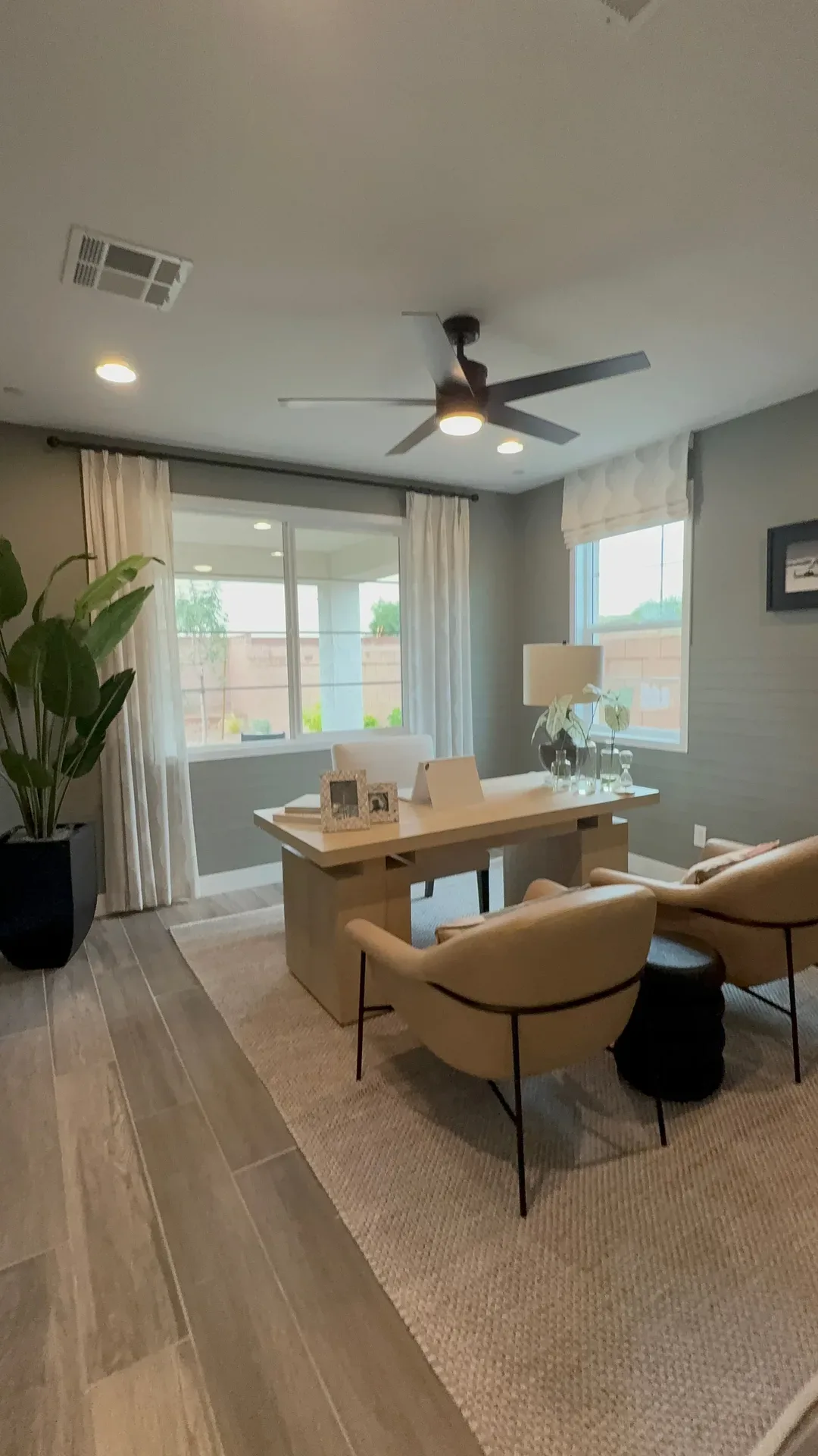 A bright, organized home office study in a modern Las Vegas home