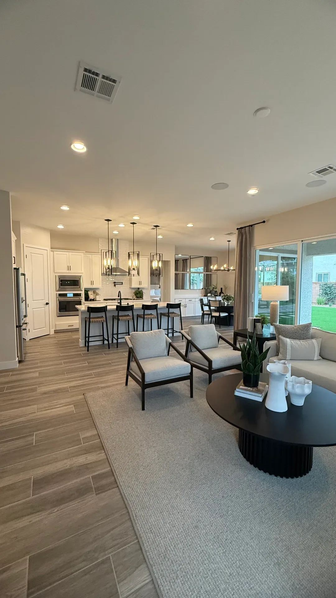 Open-concept Las Vegas living area and kitchen with neutral decor