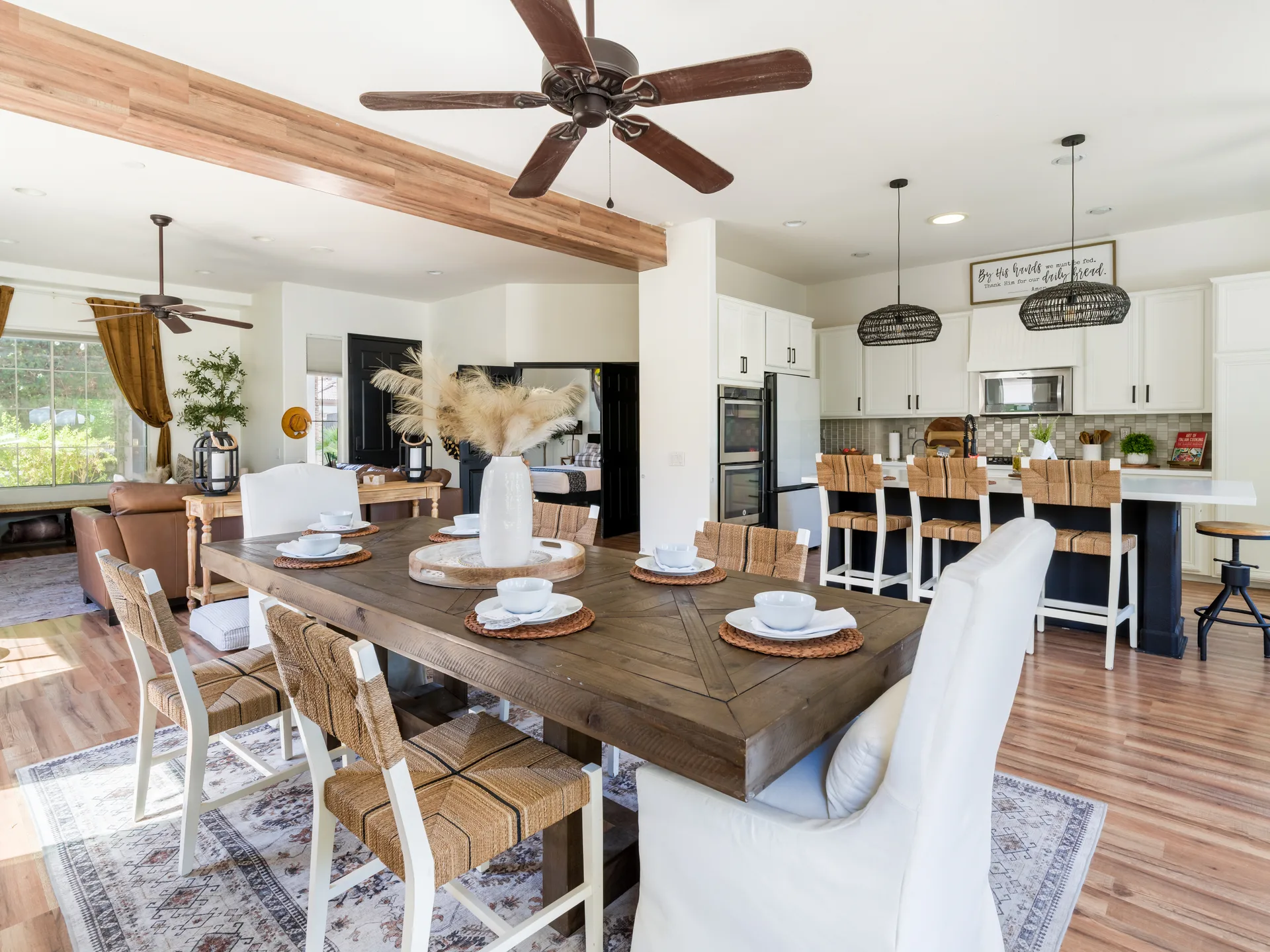 Open-concept dining and kitchen at 79818 Parkway Esplanade South, La Quinta, CA