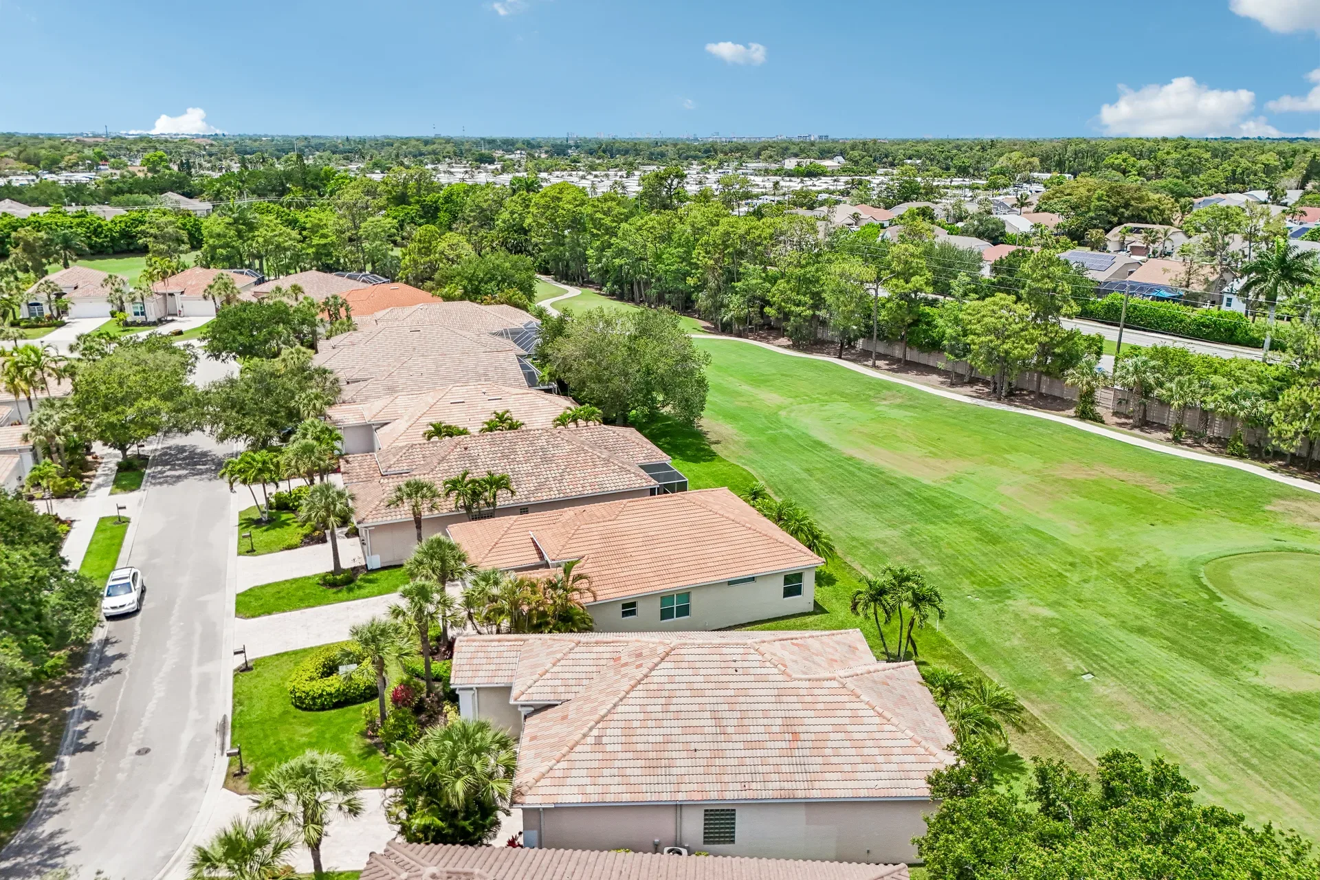 Aerial view of 309 Harvard LN and the adjacent Glen Eagle golf course