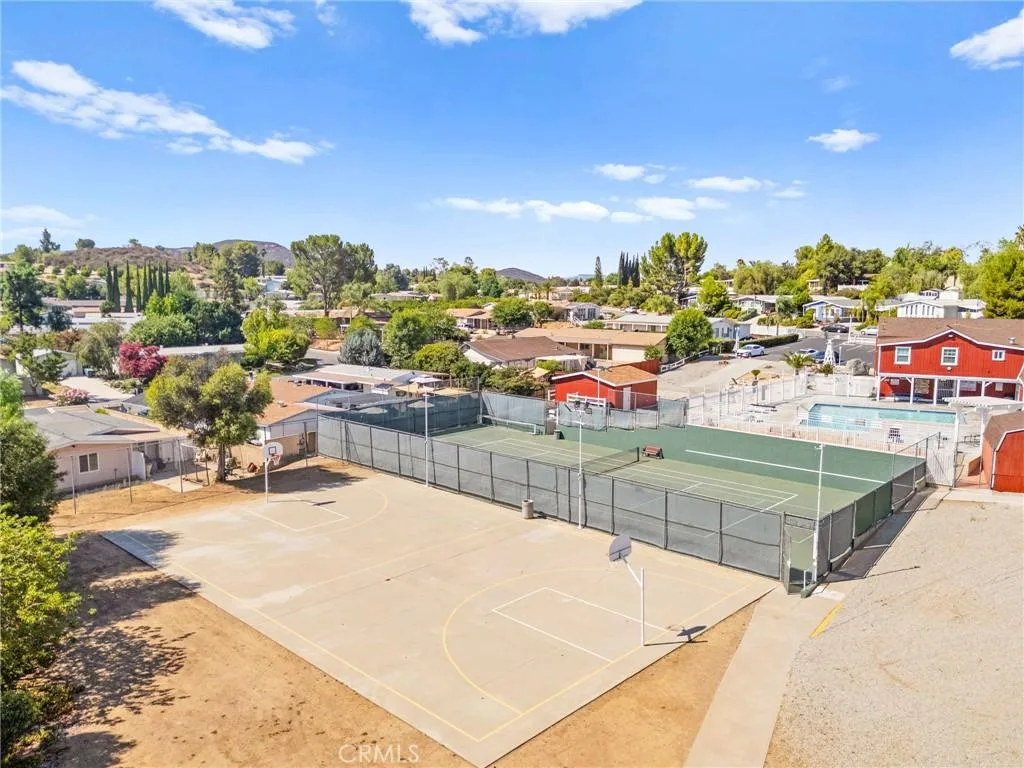 Aerial view of basketball and tennis courts in The Farm community in Wildomar