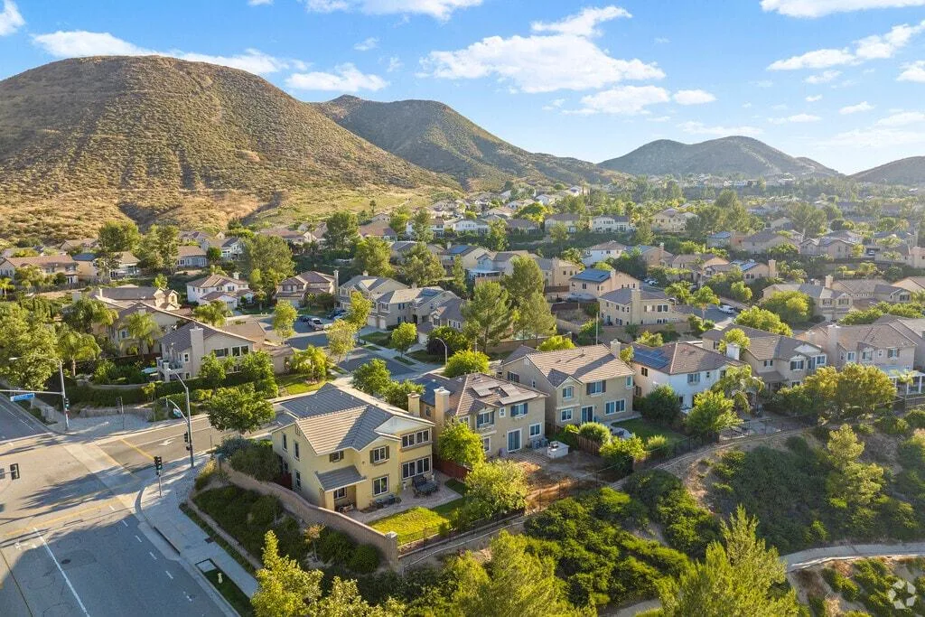 Aerial view of the Canyon Hills master-planned community in Lake Elsinore tucked against a mountain range