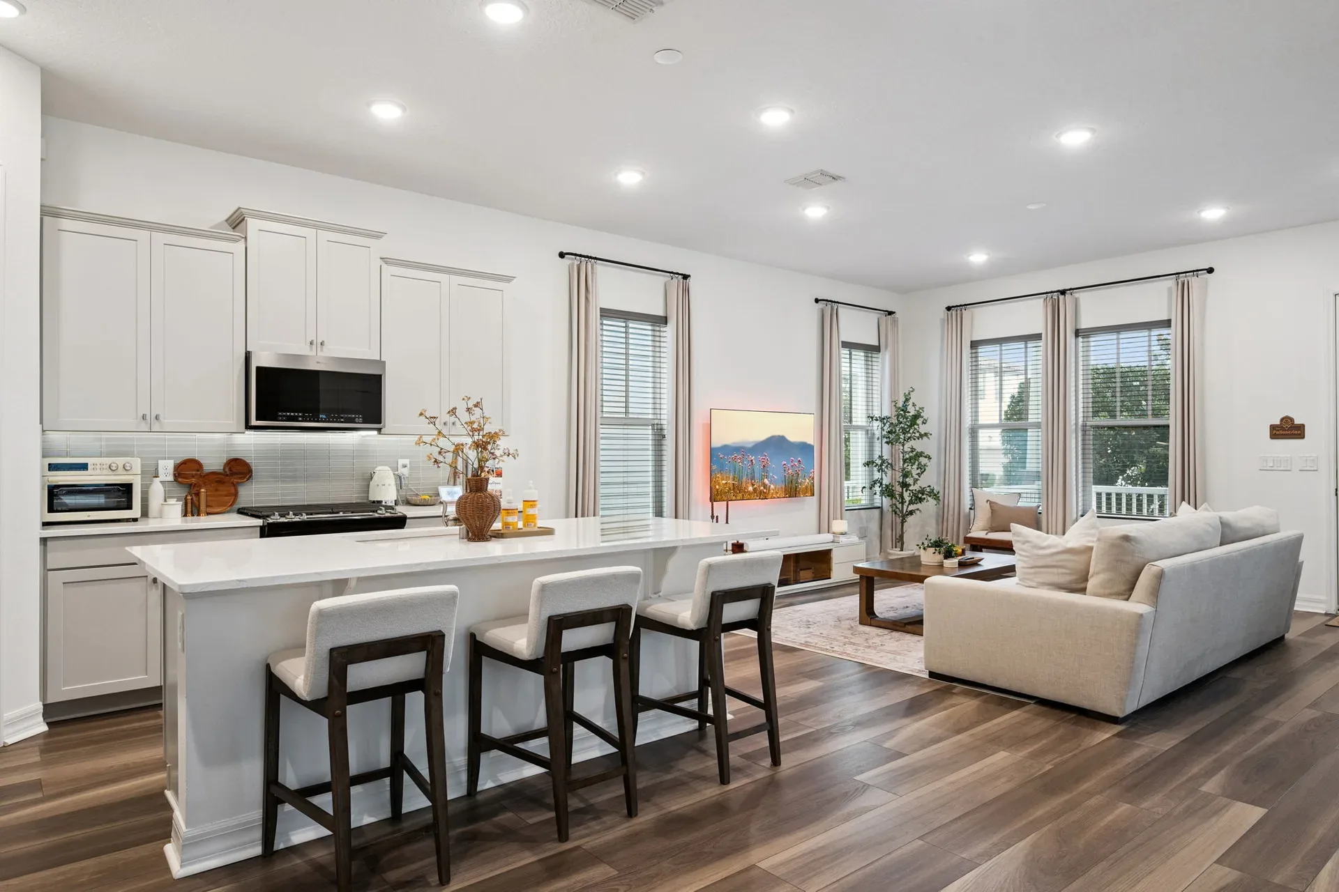 Open-concept great room and kitchen at 7313 Tidepool Pl in Celebration, Florida