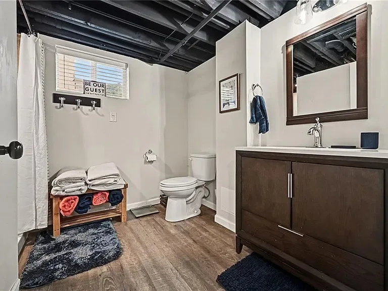Full bathroom in the finished walk-out lower level of the Merriam home