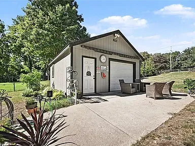 Detached garage and adjacent patio at the Merriam property on 10035 W 55th Street
