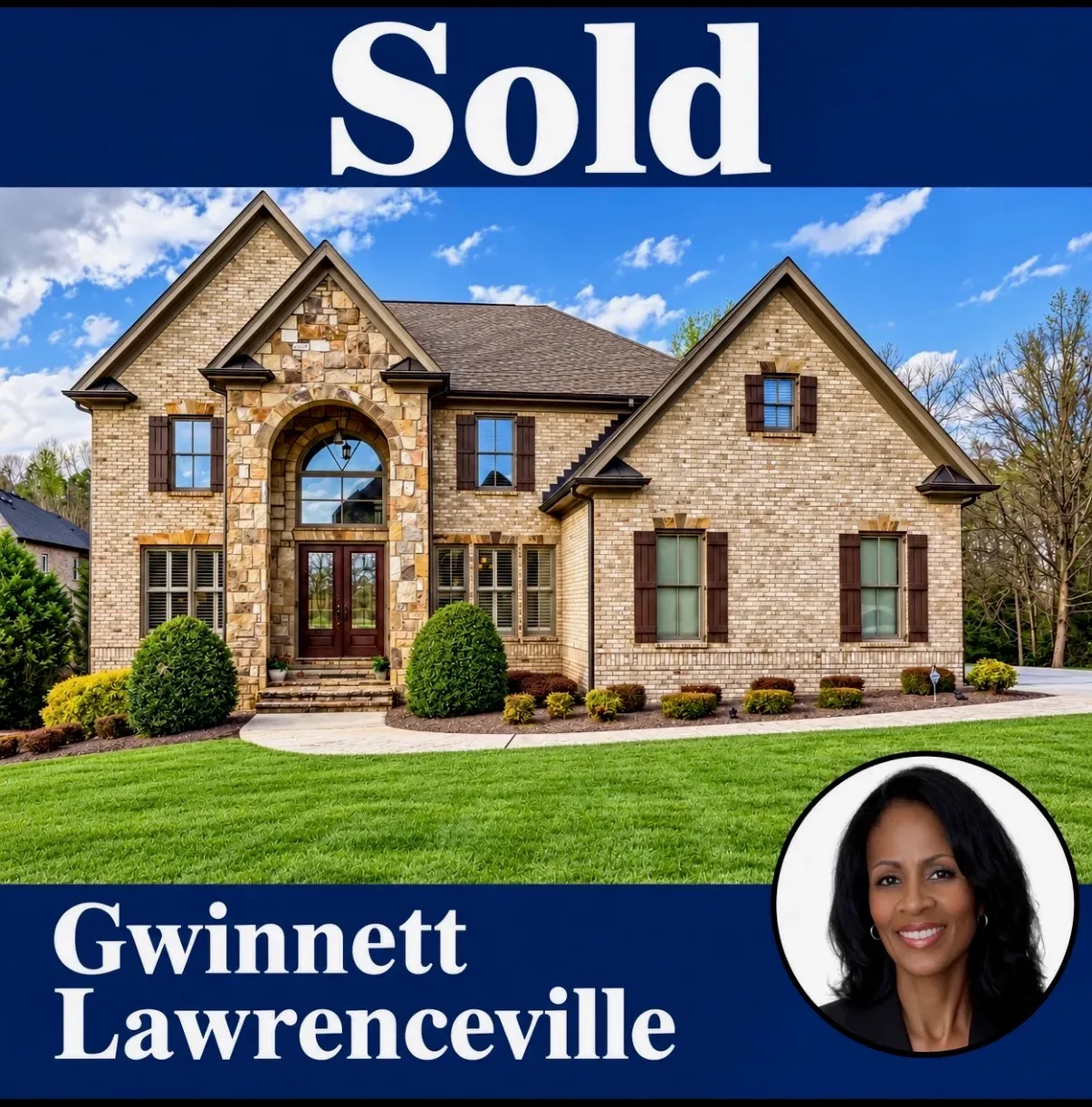 Sold brick and stone home with dark shutters and covered entry in Gwinnett County