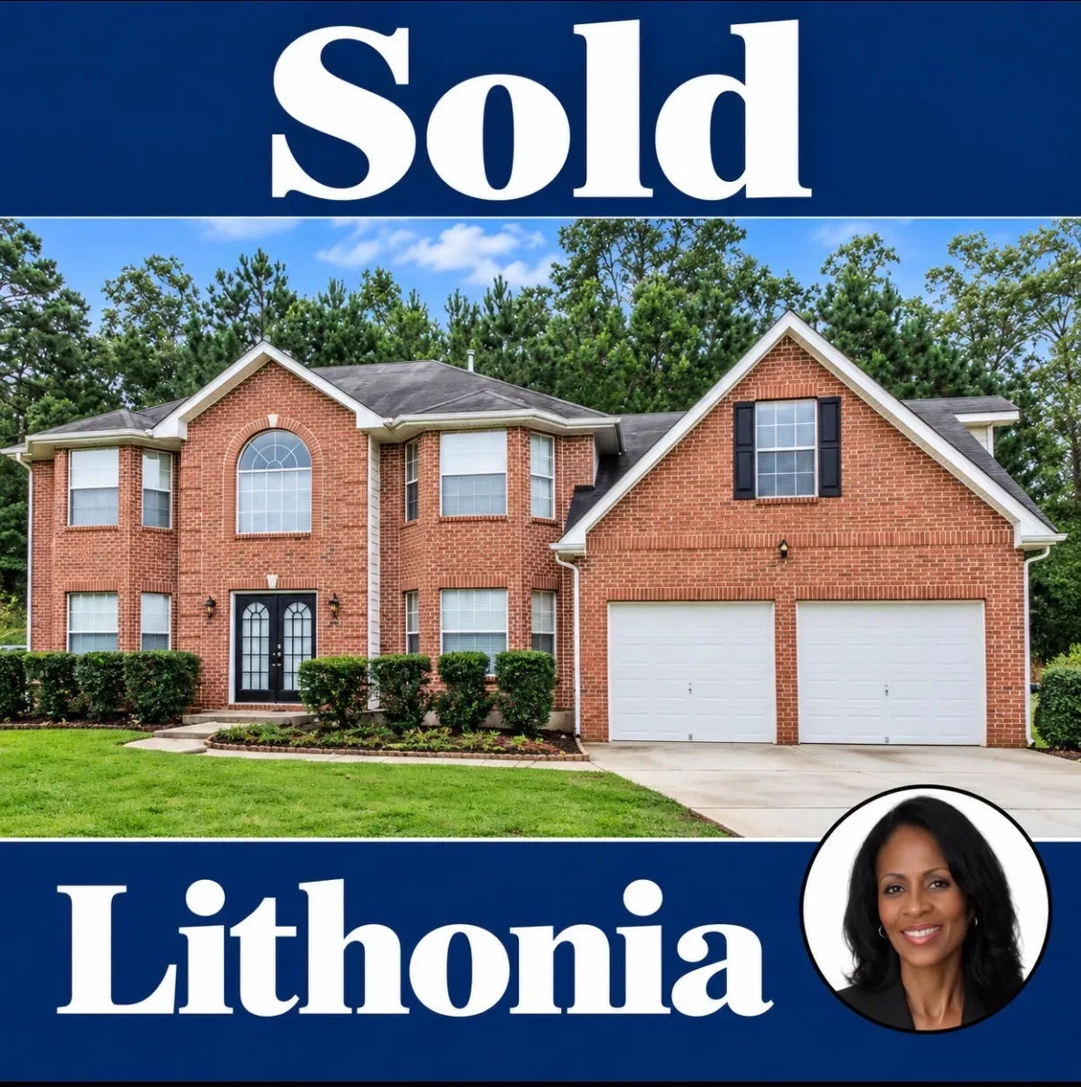 Traditional two-story brick suburban home with white garage doors and black shutters in Henry County
