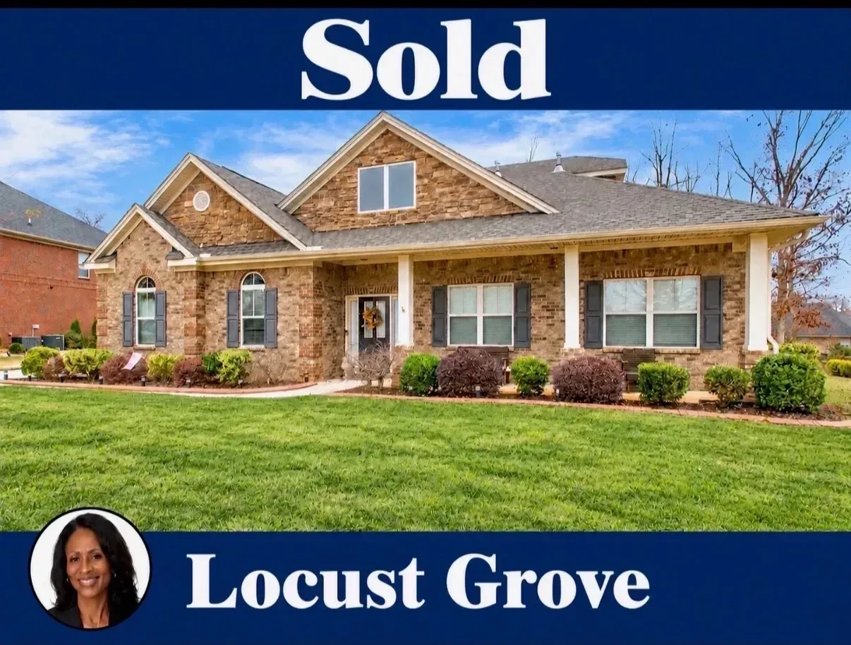 Stone facade home with white columns, a Sold banner, and the agent portrait in Henry County