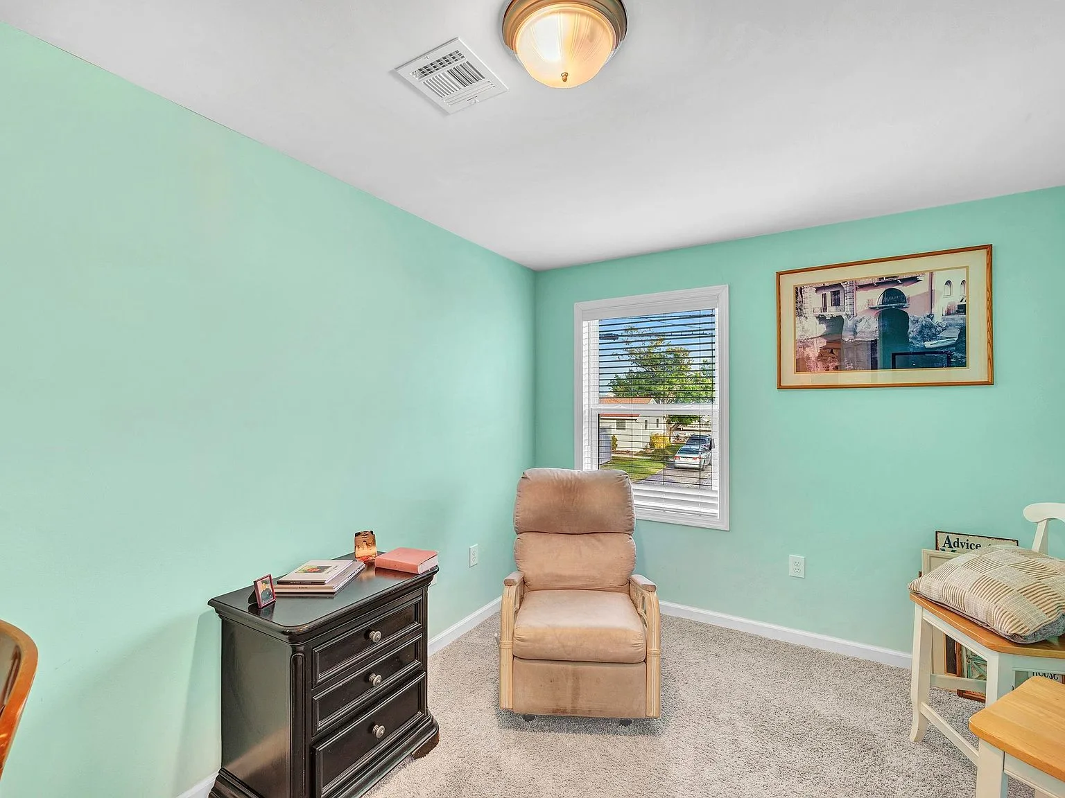 Bedroom with mint green walls