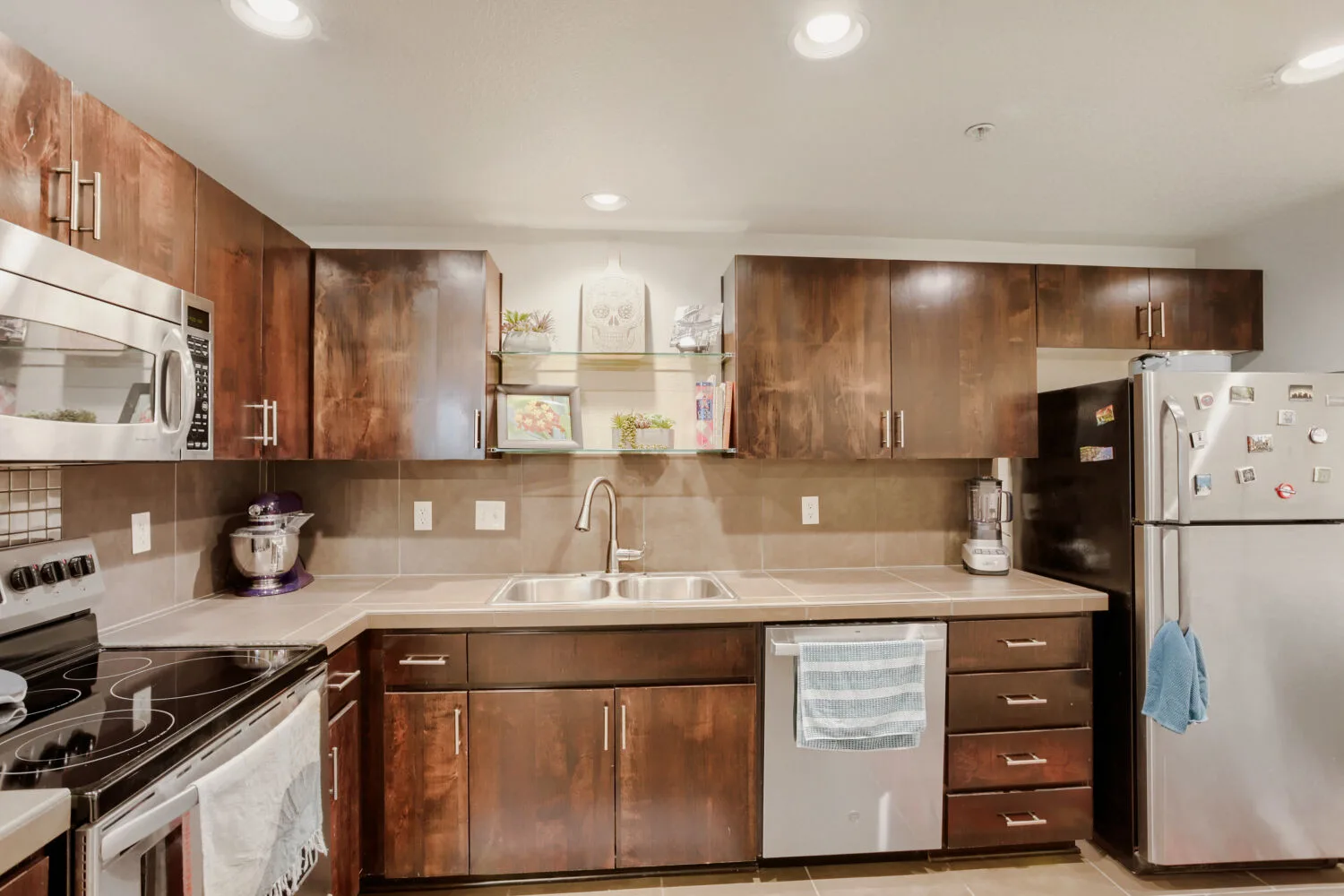 Kitchen with dark wood cabinets at 648 NE Adwick Dr, Hillsboro, OR
