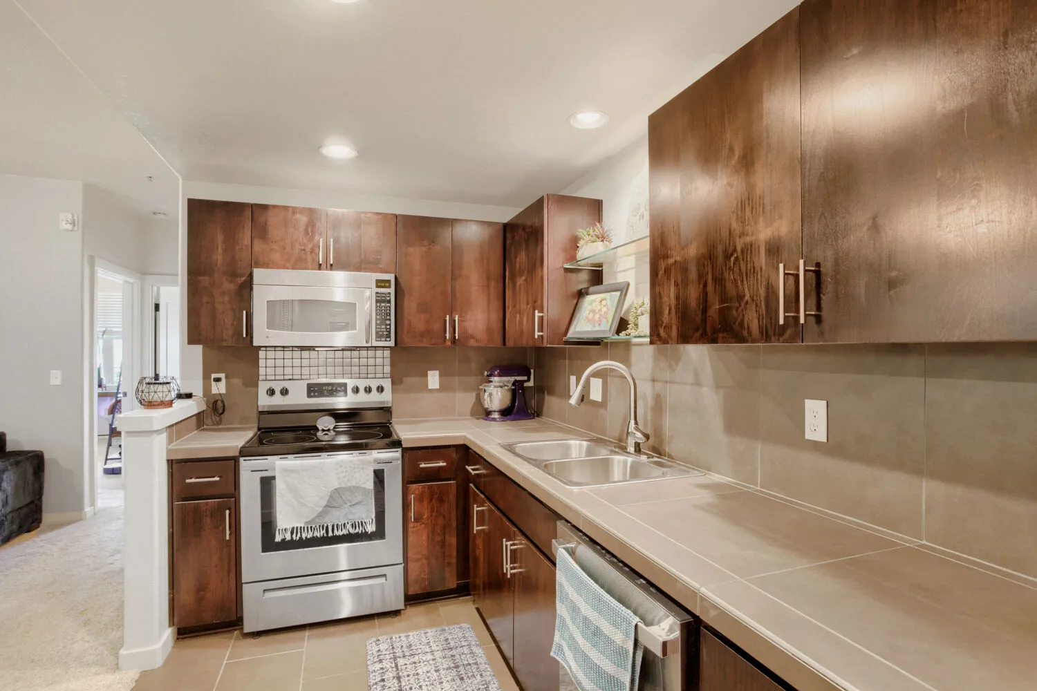 Galley kitchen with stainless steel appliances at 648 NE Adwick Dr, Hillsboro, OR