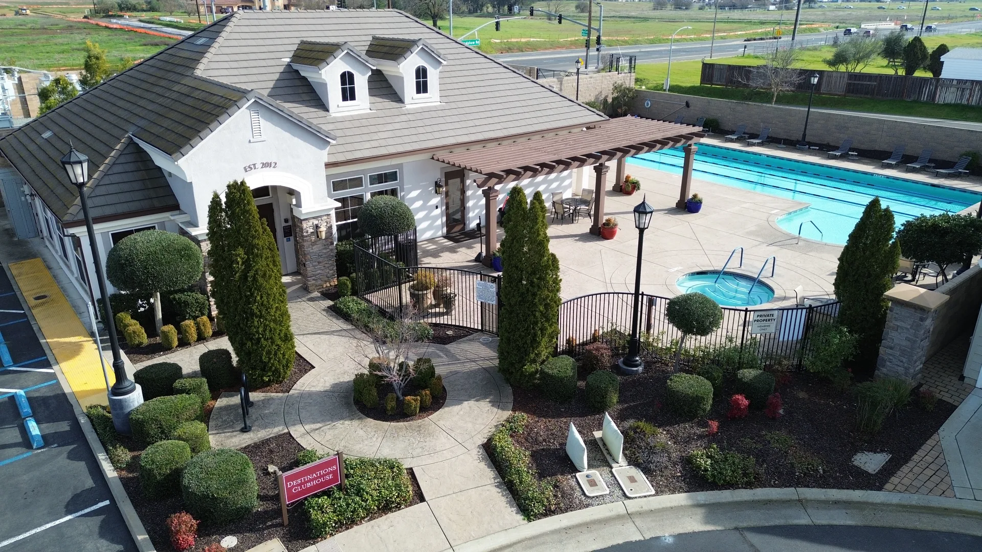 Aerial view of the Destinations at Vineyard Point clubhouse with pool and spa in Sacramento, California