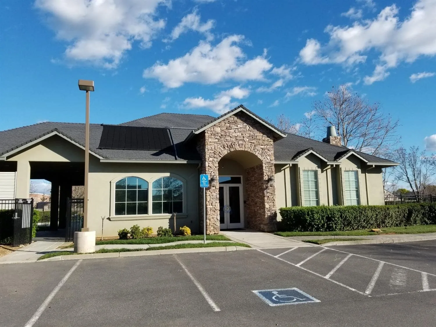 The resident clubhouse exterior at Emerald Village, the 55+ active-adult community in Galt, California