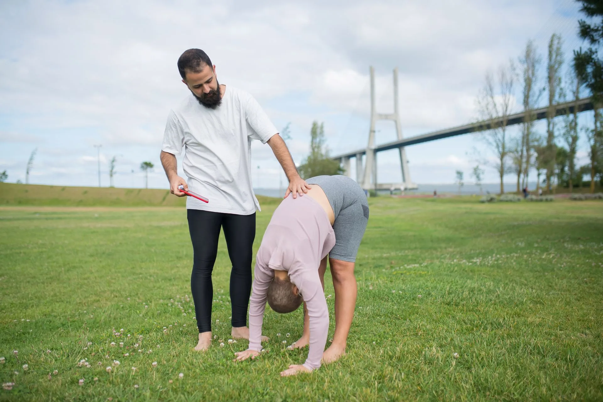 An outdoor physical therapy session in a park setting