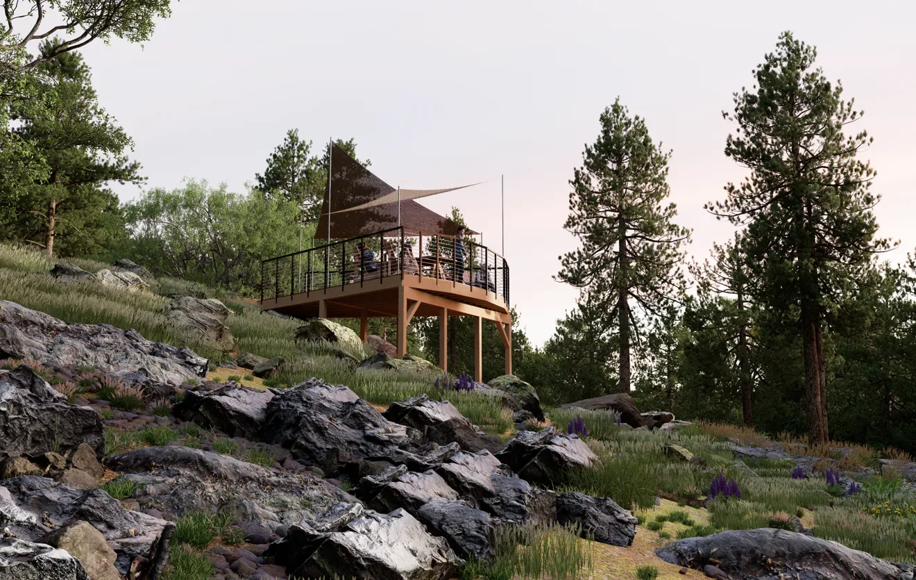 Raised deck overlook among pines and granite boulders in the evening light at Pine Valley