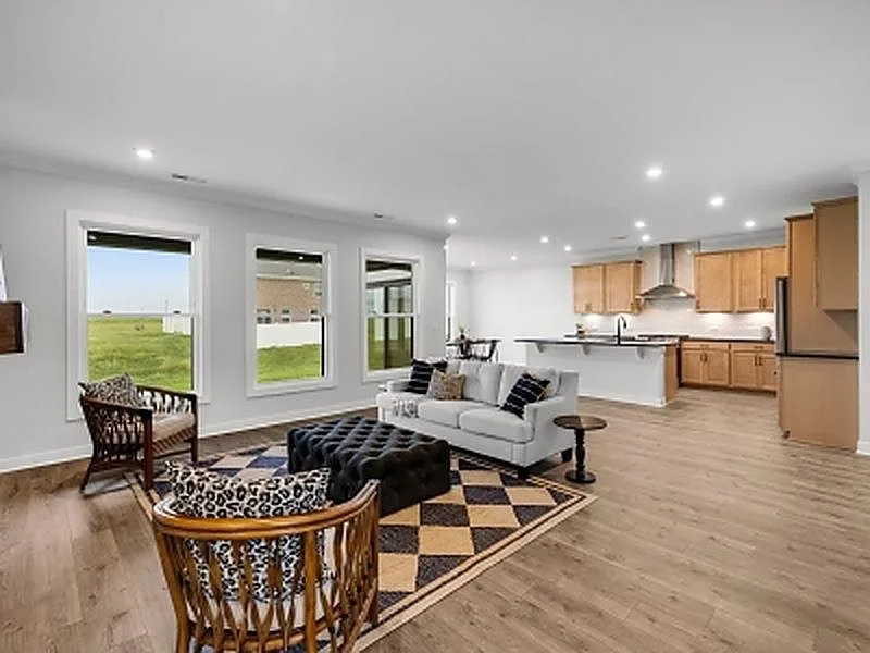 Open-concept kitchen and family room with island