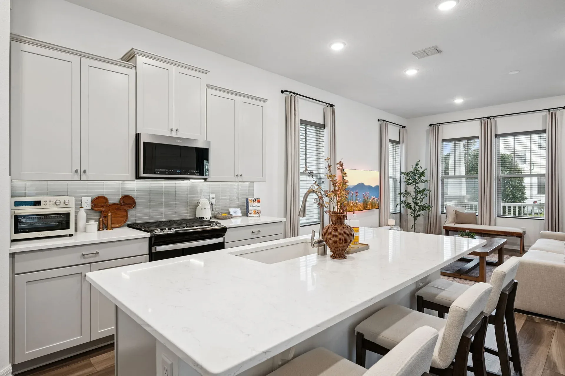 Kitchen island with bar seating at 7313 Tidepool Pl in Celebration, Florida