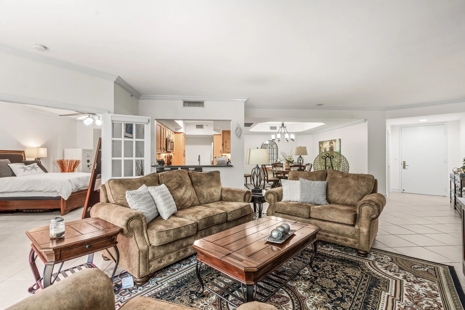 Bright open-concept living room at 500 SE Mizner Boulevard #A209 in Townsend Place, Boca Raton