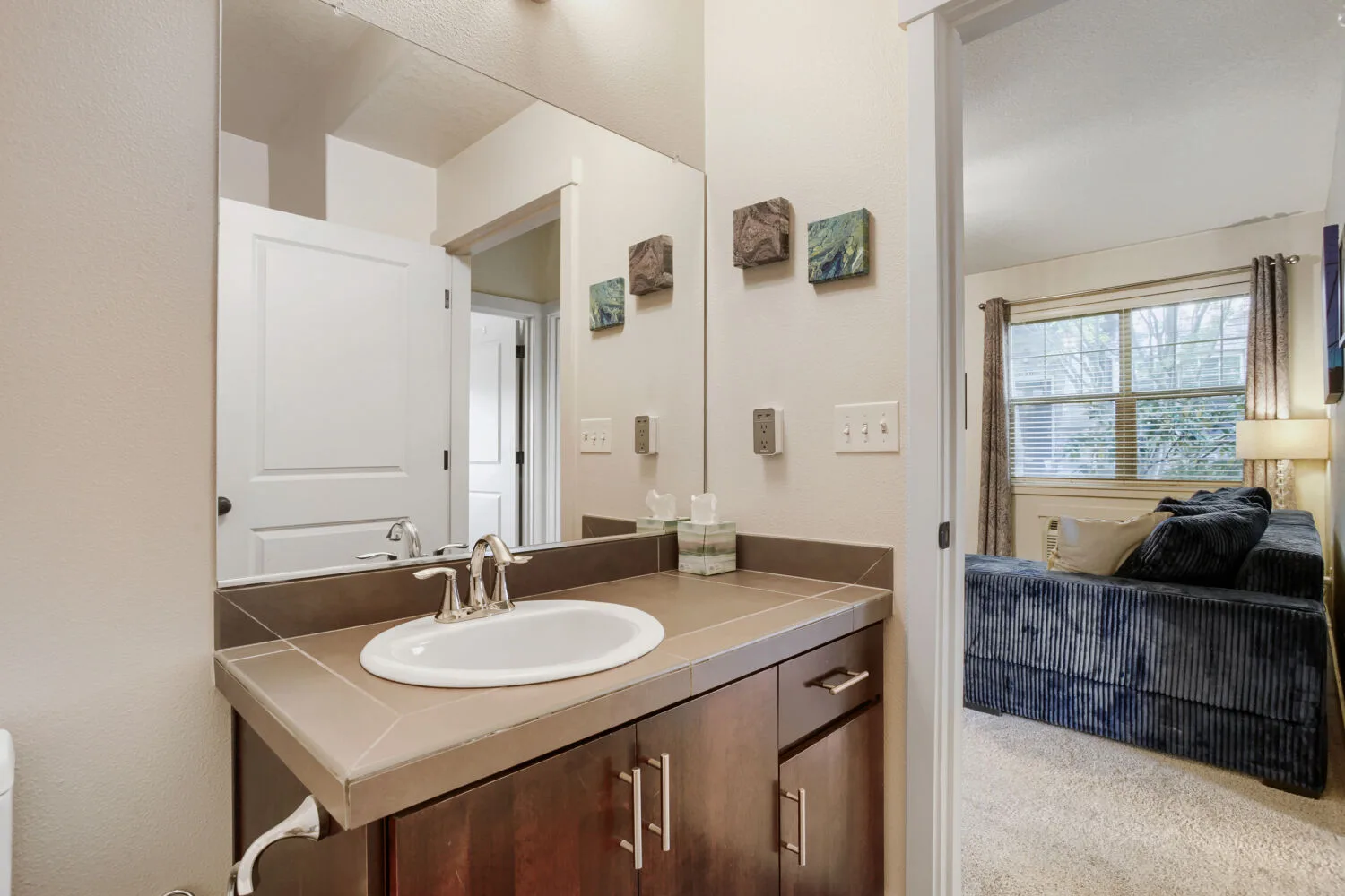 Bathroom vanity with tiled countertop at 648 NE Adwick Dr, Hillsboro, OR
