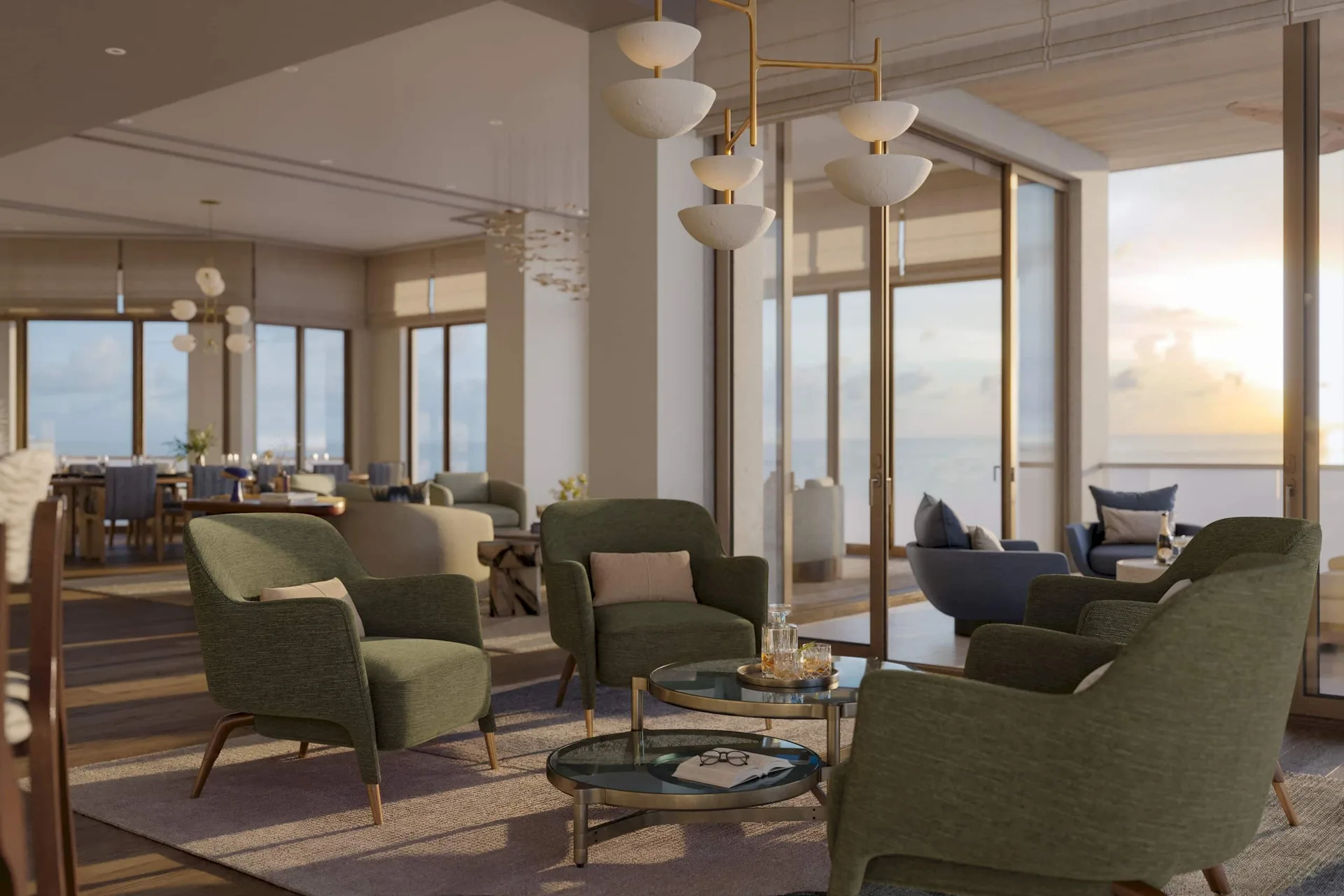 Sala de estar del penthouse en Rosewood Residences Naples con paredes minimalistas, cristal de piso a techo y luz de atardecer sobre el Golfo