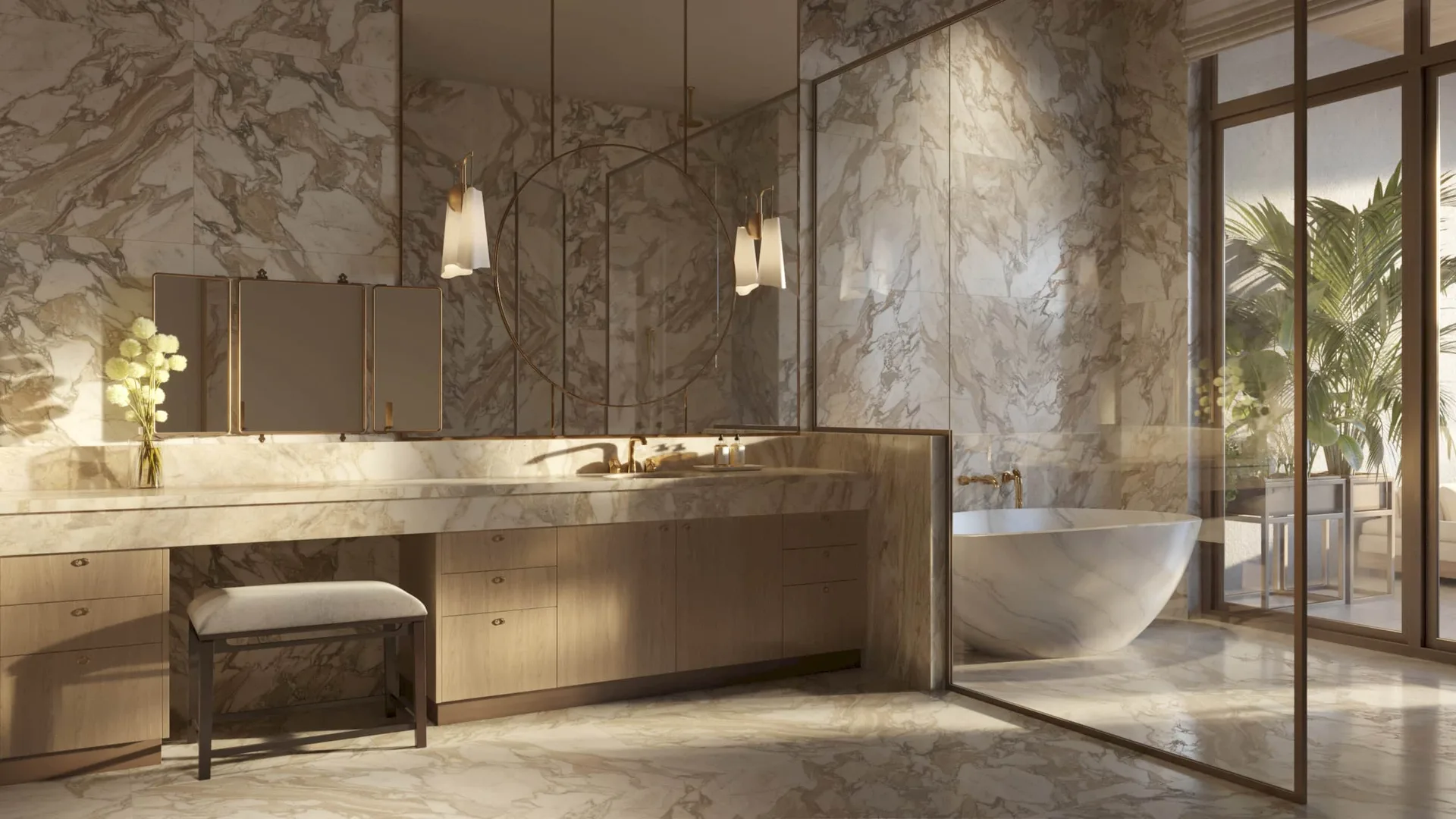 Bano del penthouse en Rosewood Residences Naples con marmol a juego de piso a techo, tina independiente y acentos de bronce