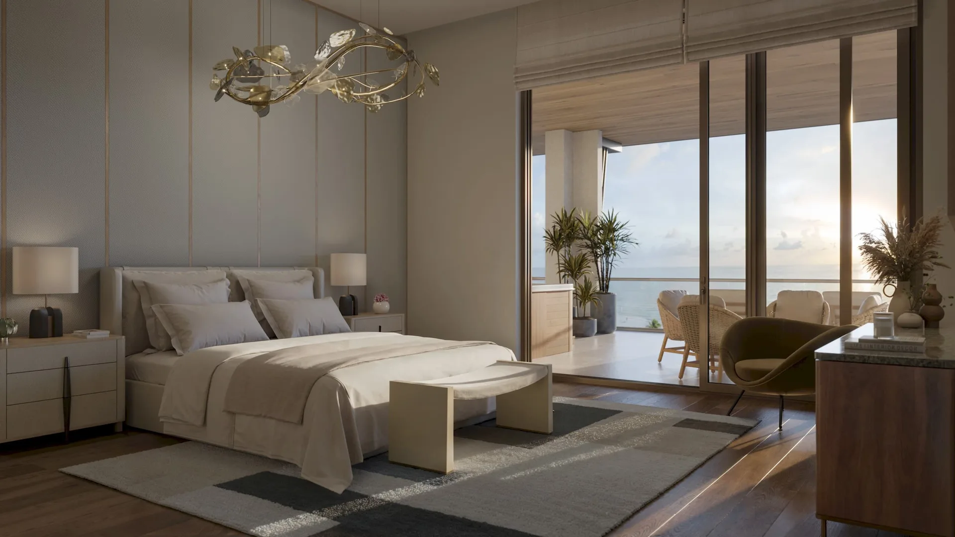 Dormitorio principal del penthouse en Rosewood Residences Naples con pared decorativa, pisos de madera y puerta corrediza al balcon