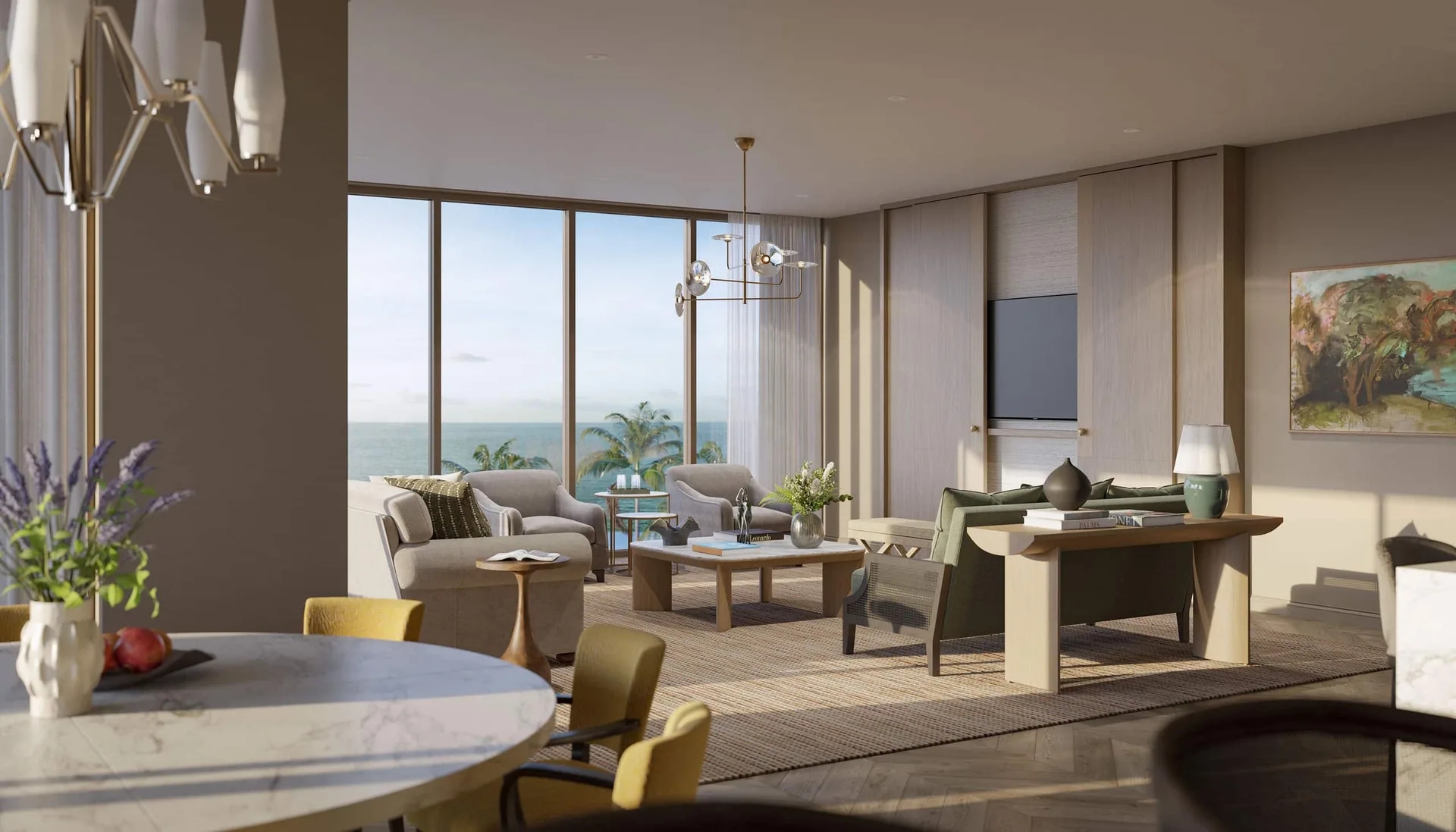 Sala de estar y comedor en Rosewood Residences Naples con vistas al mar, pisos de madera y pared decorativa con paneles