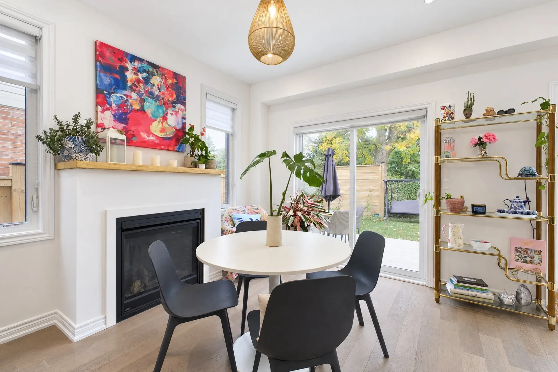Dining room with gas fireplace and wood mantel