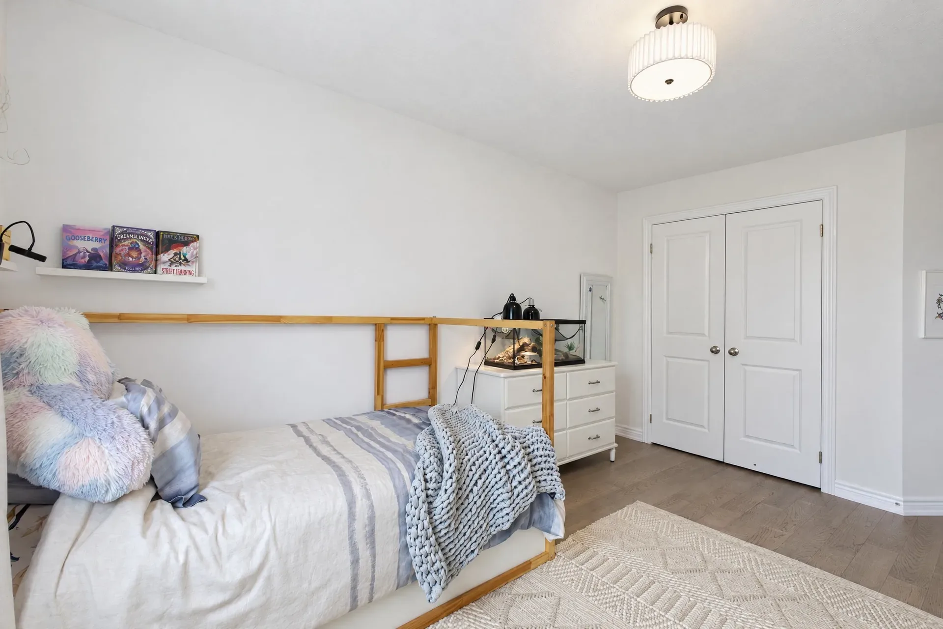 Secondary bedroom: Neutral room with double-door closets