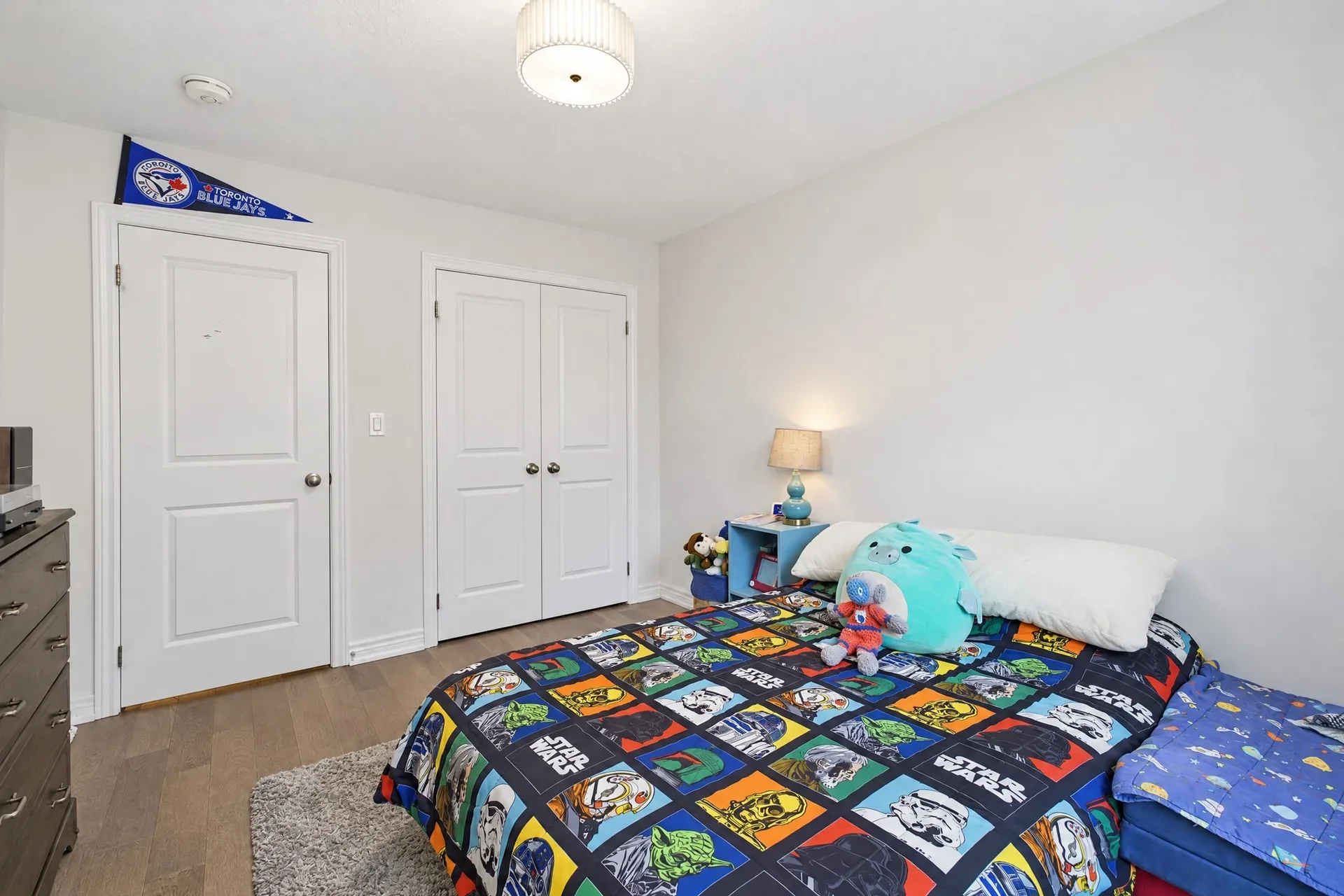Secondary bedroom: Bright, airy room with closet storage