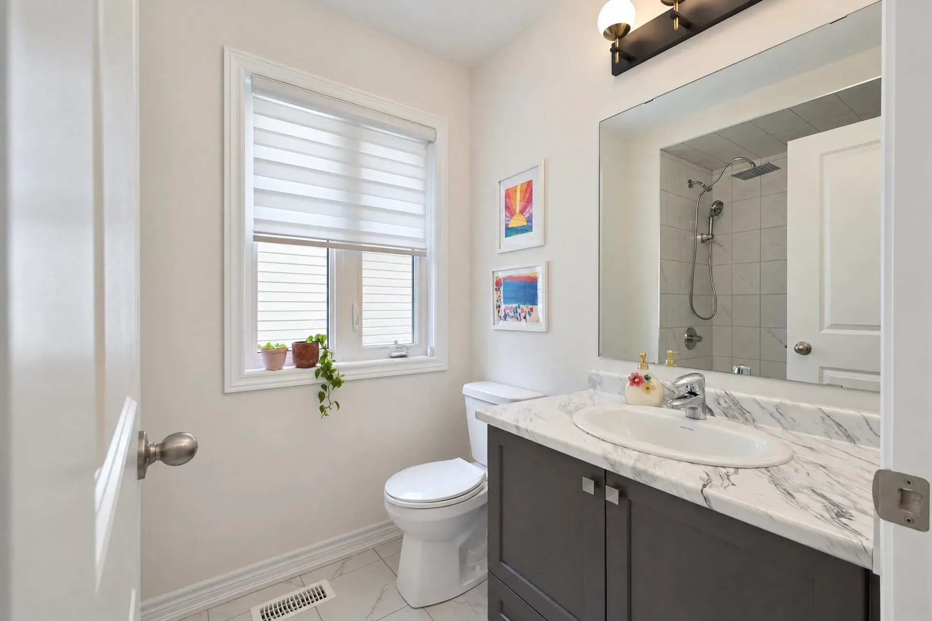 Bathroom vanity: Stone counter and tiled floor