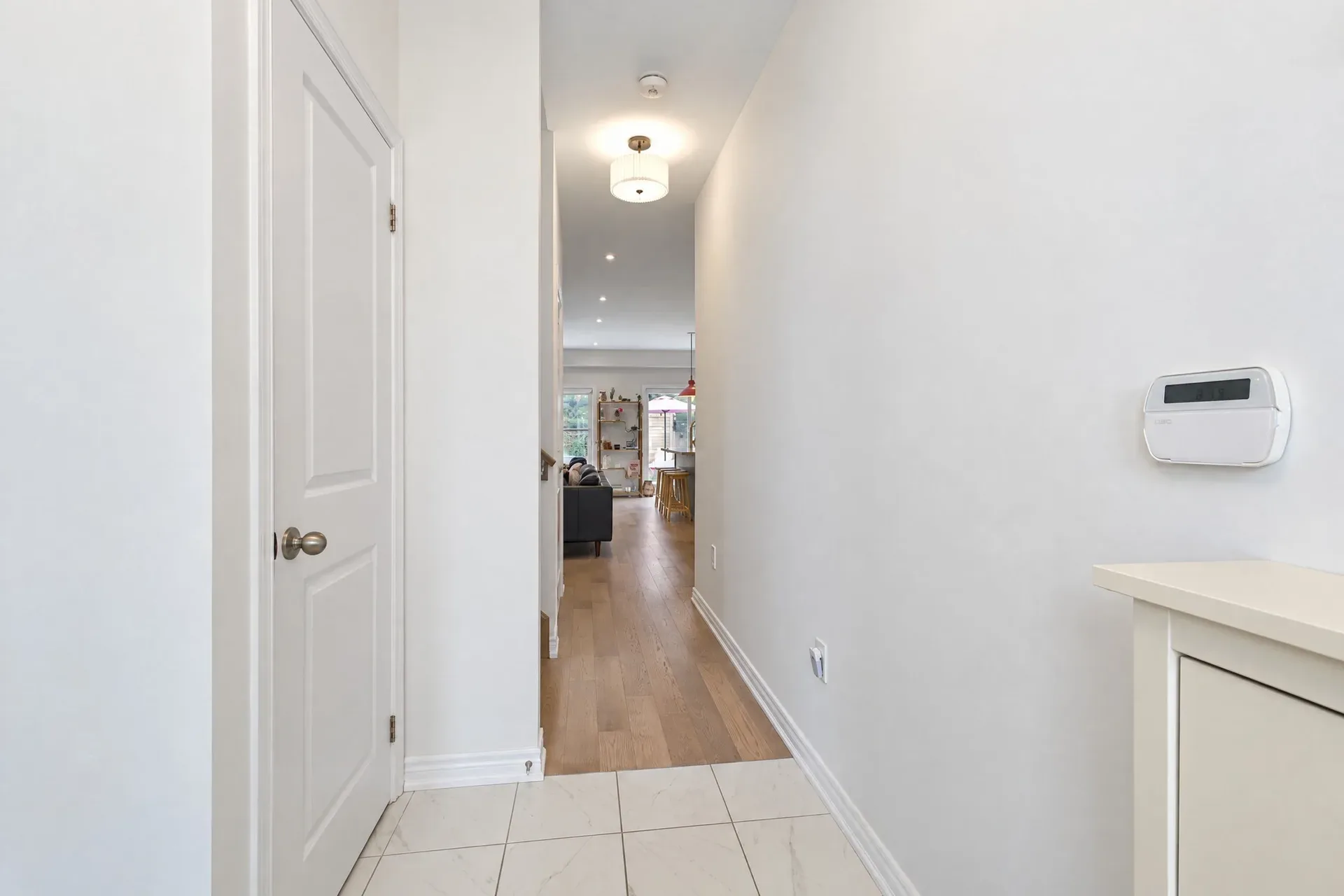 Foyer hallway: Hardwood carries into the open-concept living area