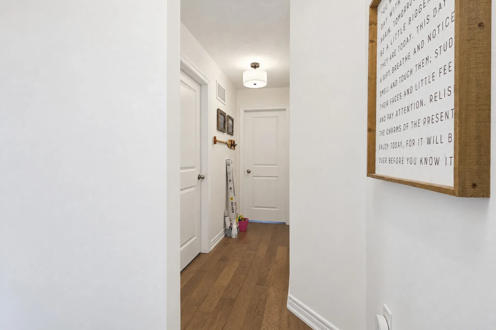 Interior hallway: Clean lines and wood-tone flooring
