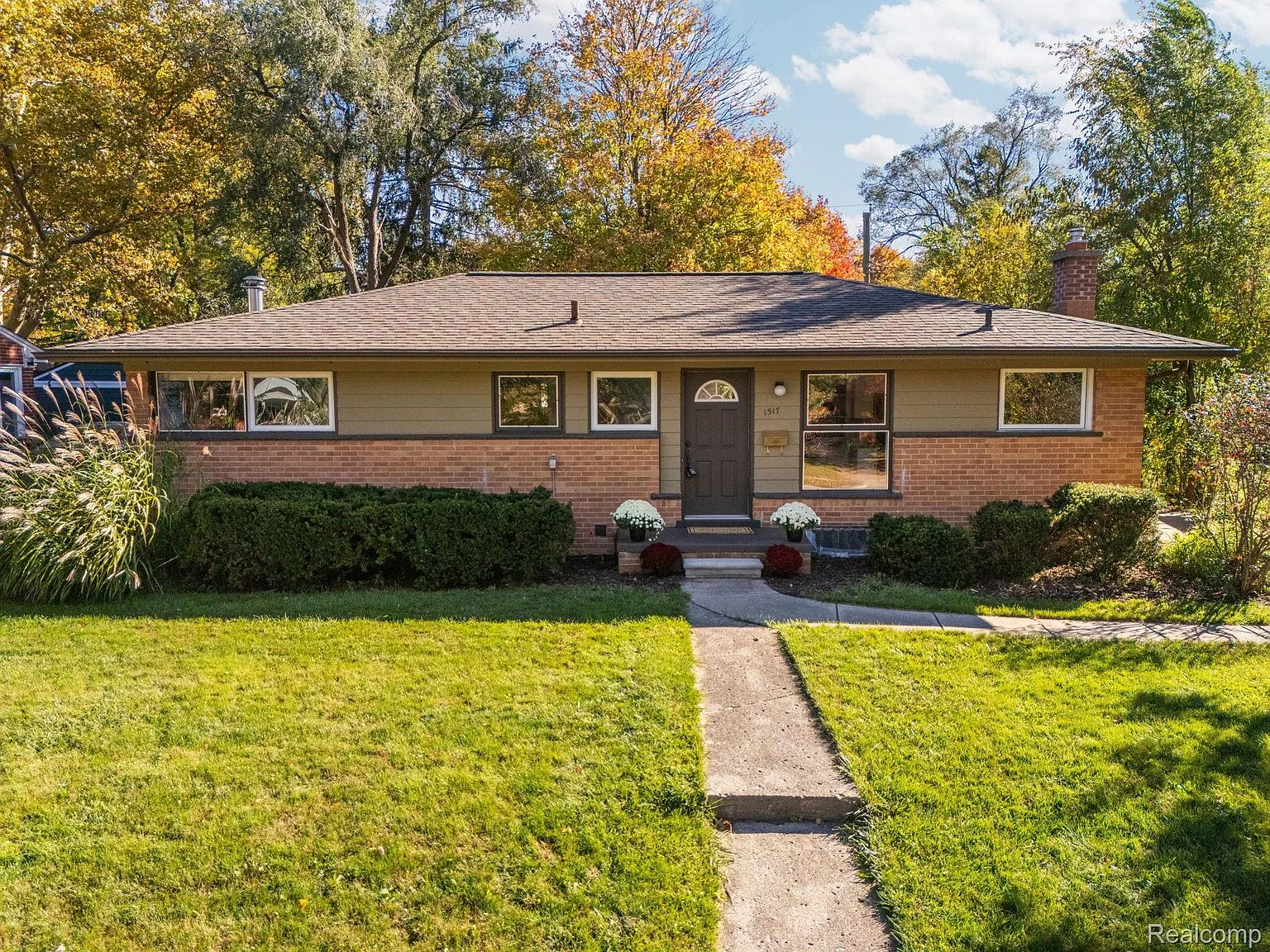 Front exterior of 1517 Catalina Dr, an updated brick ranch home on Ann Arbor's west side
