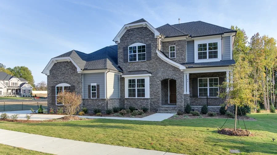 Stone facade home exterior in Salem Village, Apex NC