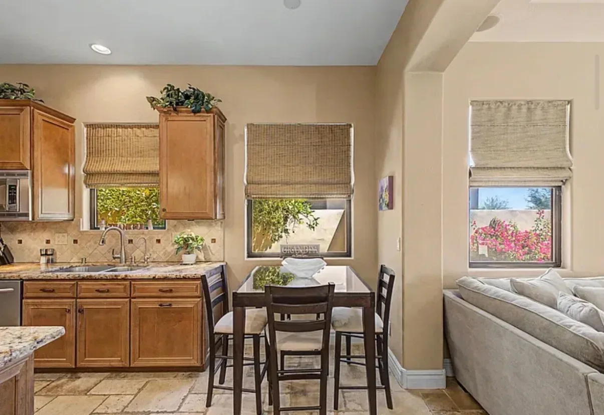 Kitchen with an adjoining breakfast and living area
