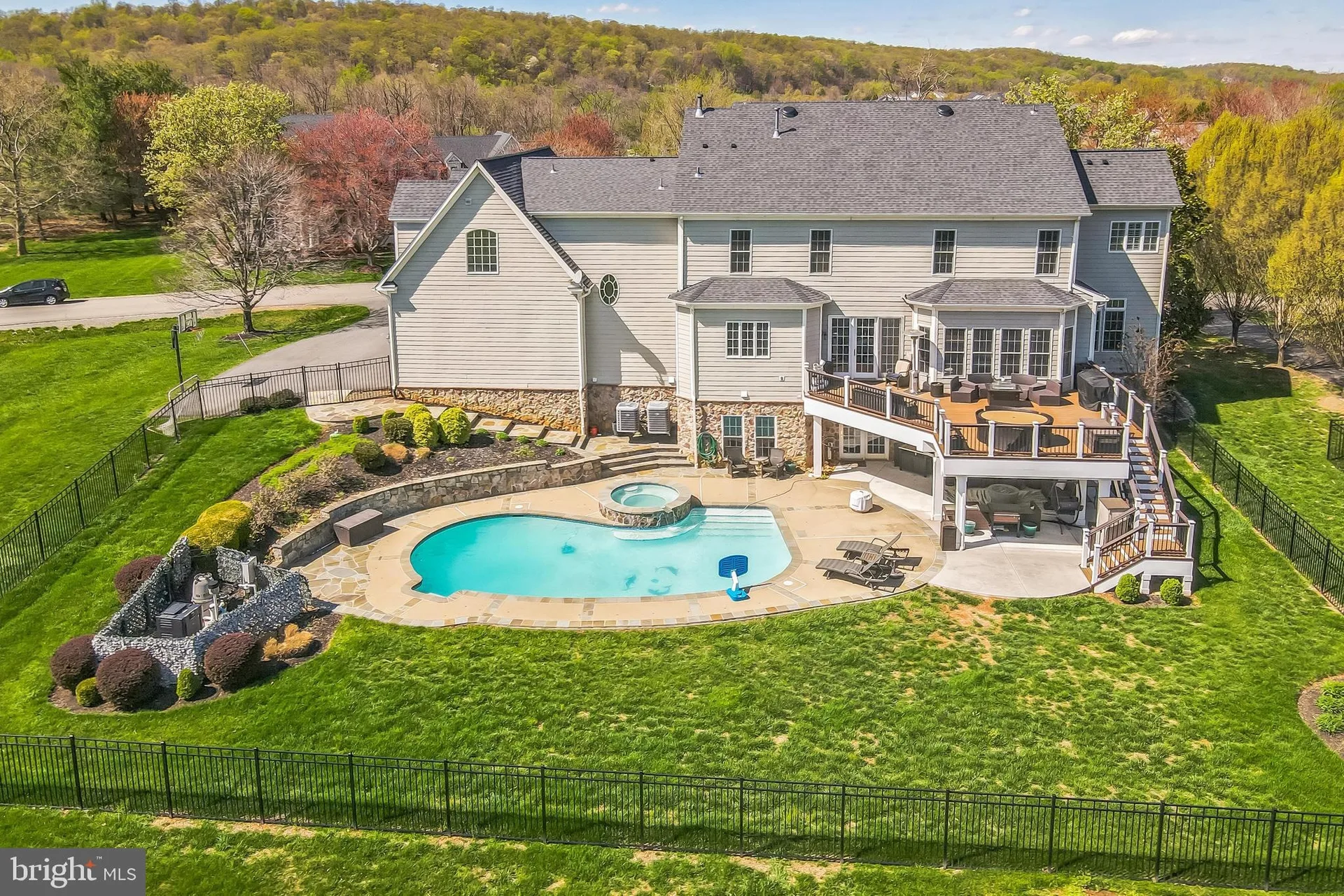 Backyard pool and deck at 41597 Swiftwater Dr, Leesburg, VA