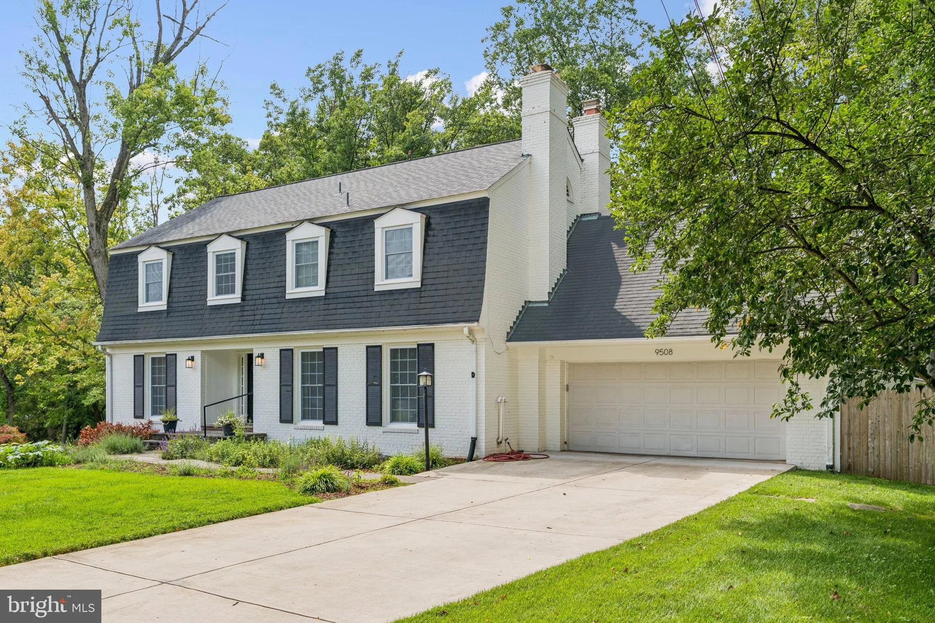 White brick colonial facade at 9508 Newbold Place, Bethesda, MD