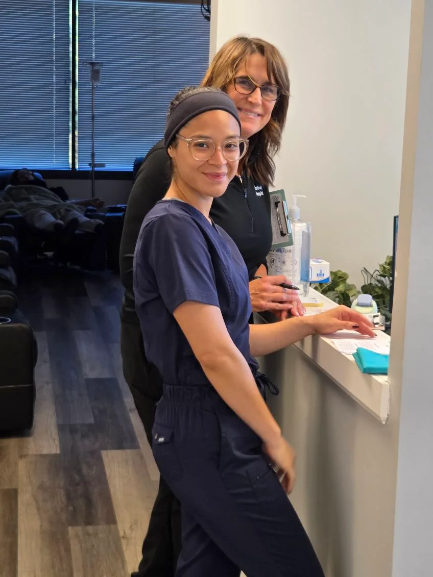 APRM Solutions front desk team welcoming patients